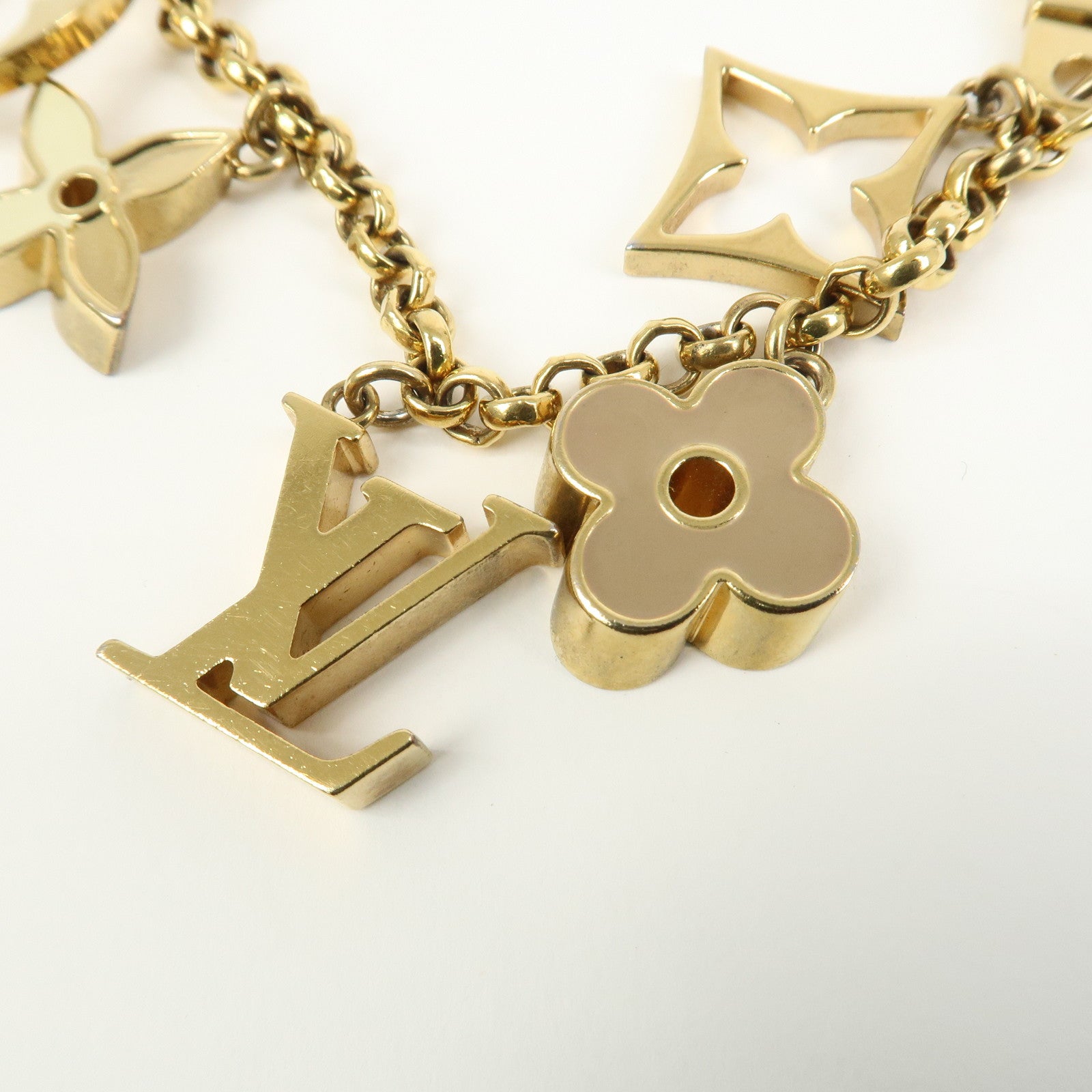 Louis Vuitton Fleur de Monogram Bag Charm Key Chain Gold M65111
