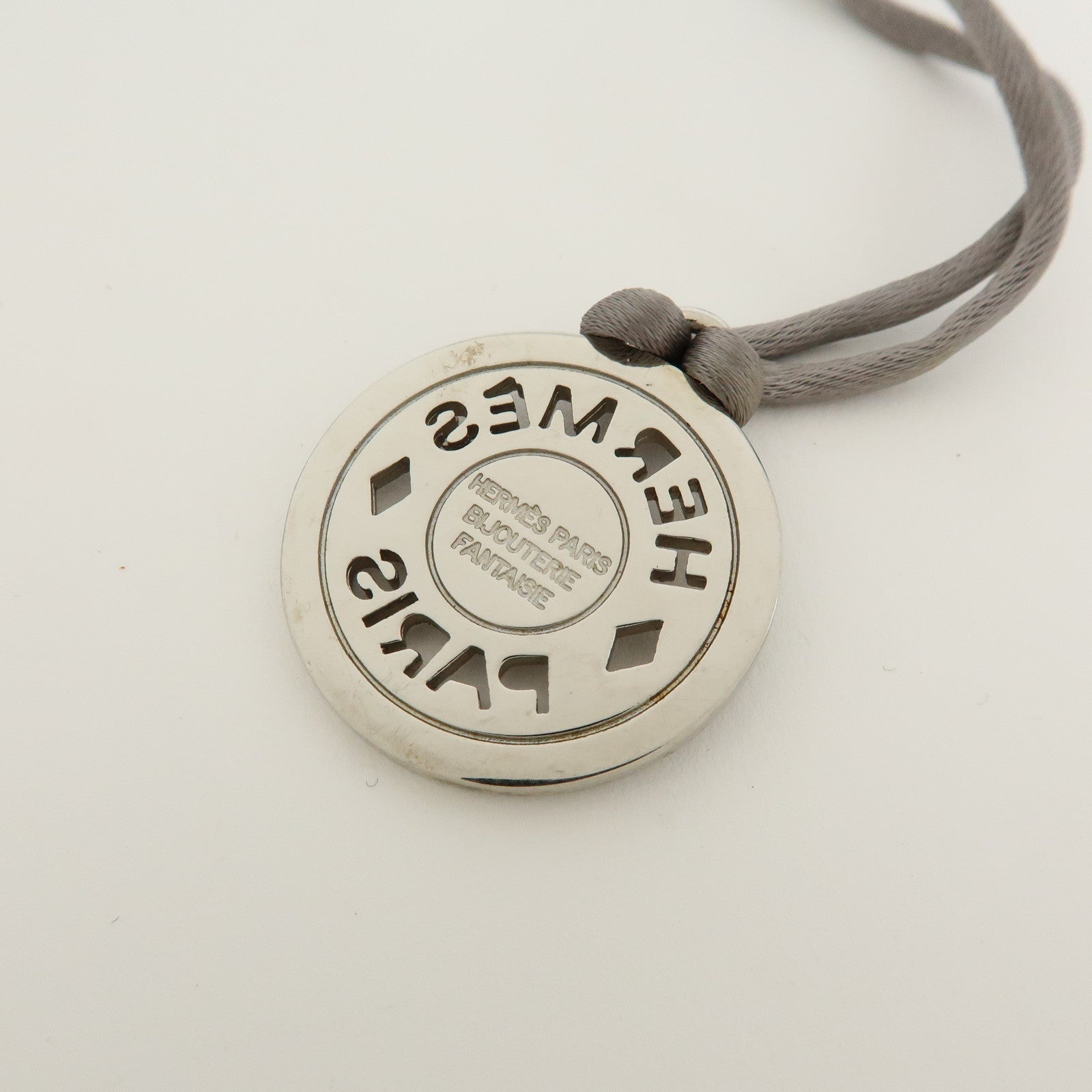 HERMES Serie Silk Cord Metal Necklace Pendant Silver Gray