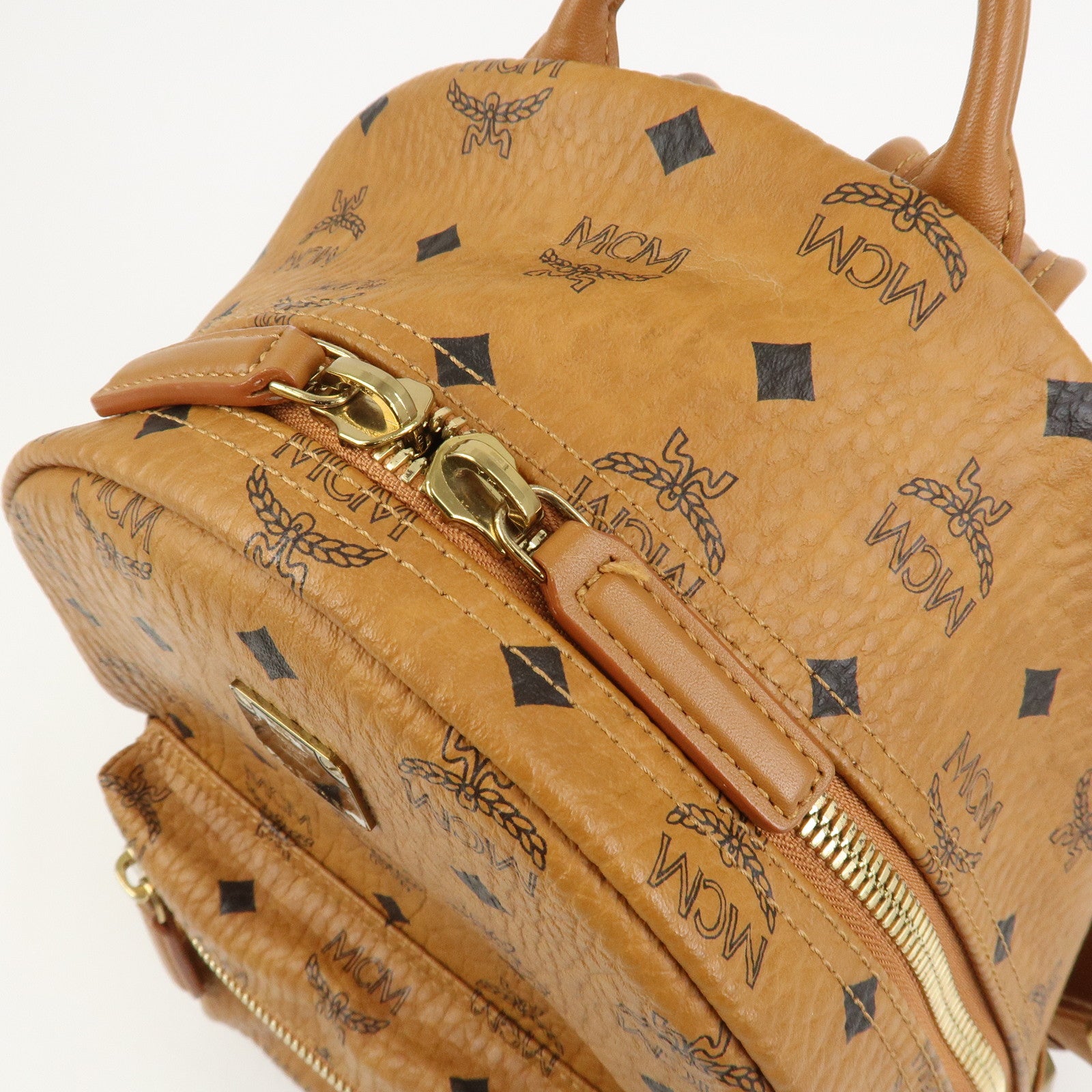 MCM Visetos PVC Leather Backpack Rucksack Studs Cognac