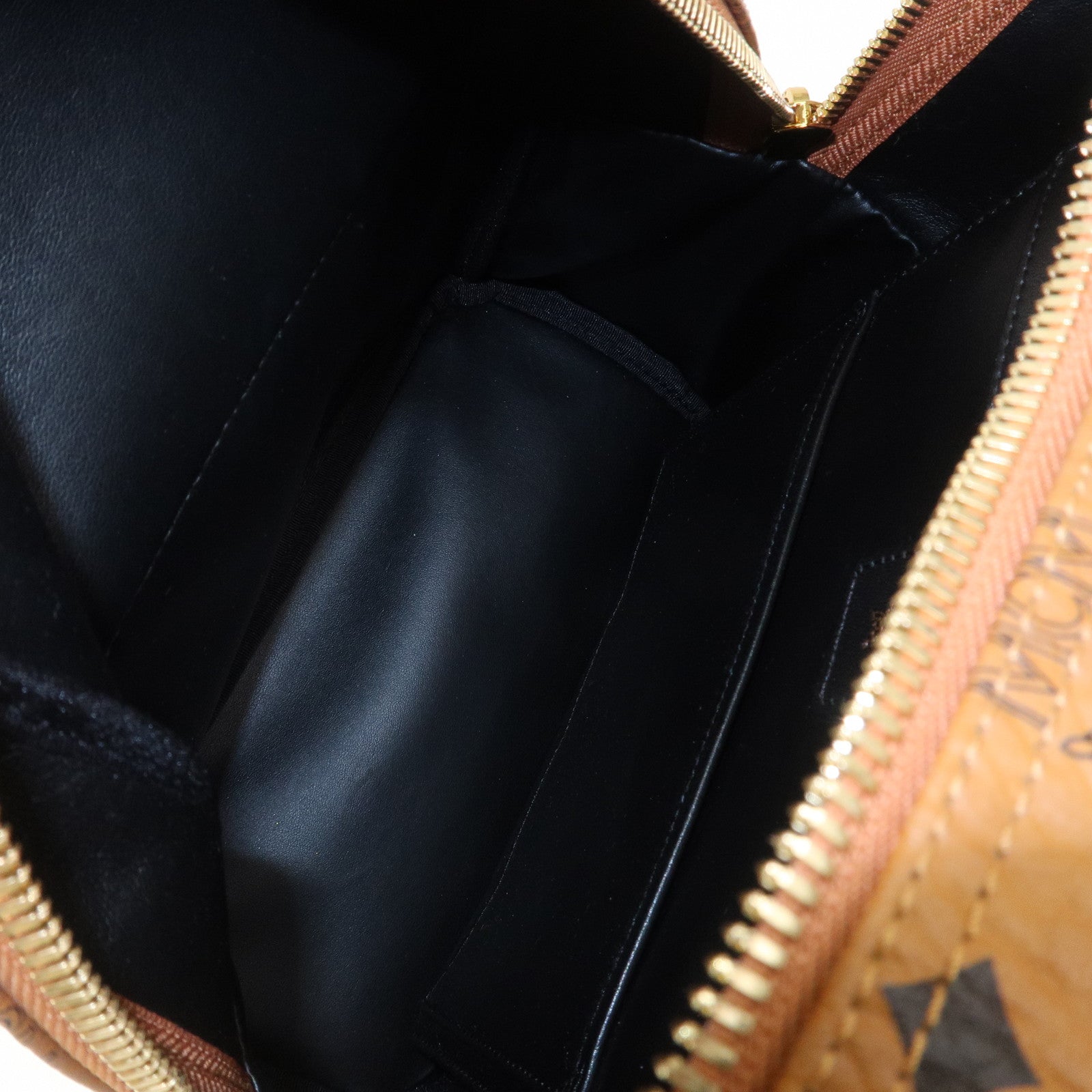 MCM Visetos PVC Leather Backpack Rucksack Studs Cognac