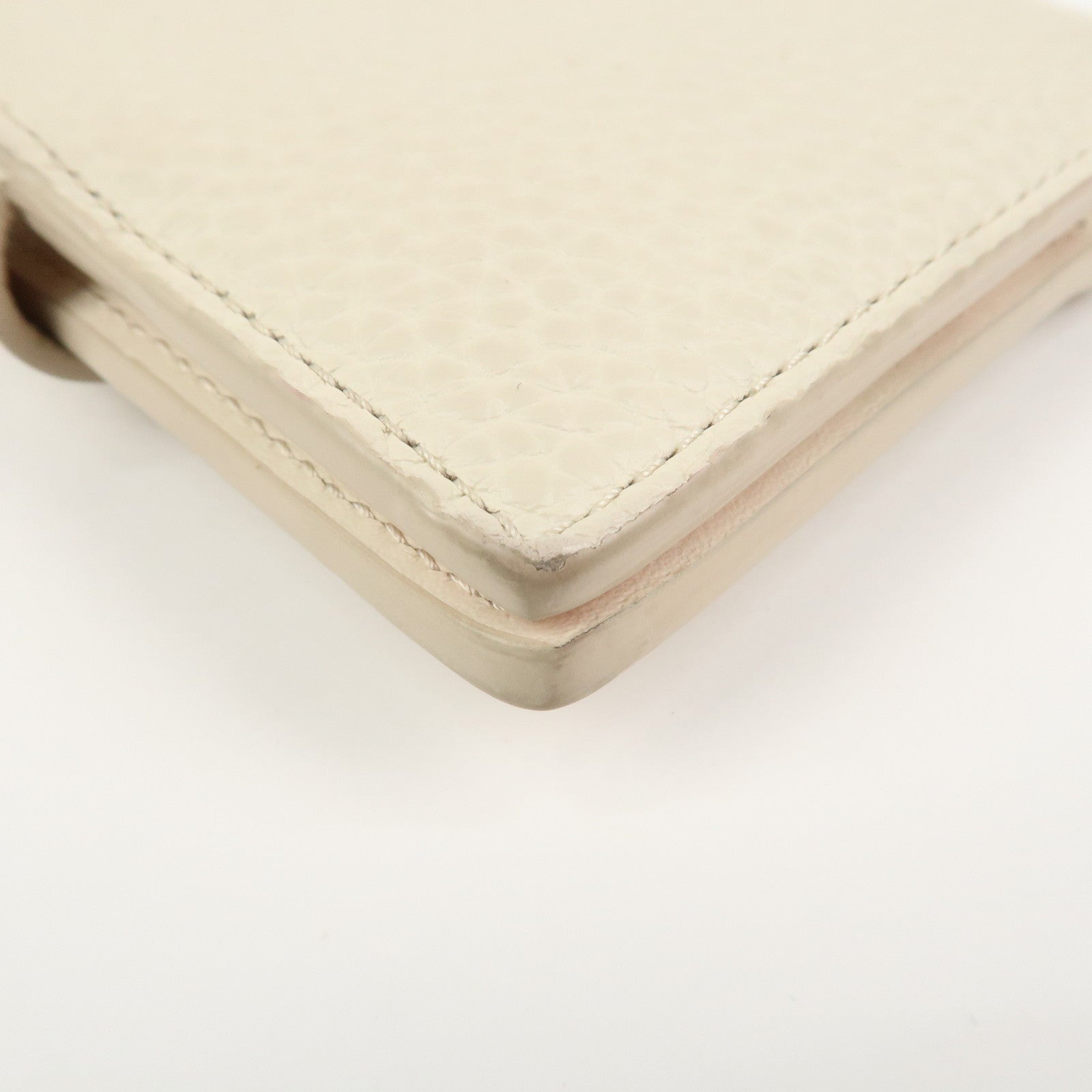 Louis Vuitton Capcines Taurillon Leather Vertical Wallet M11169