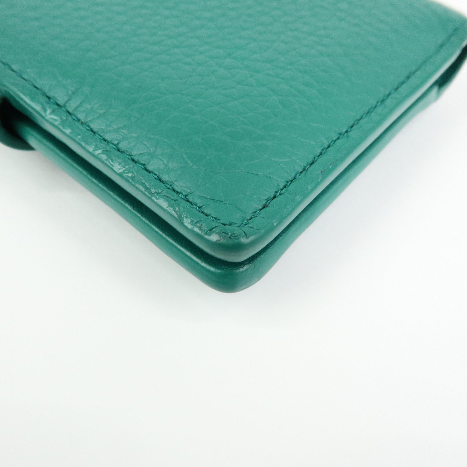 Louis Vuitton Taurillon Leather Vertical Compact Wallet M82438