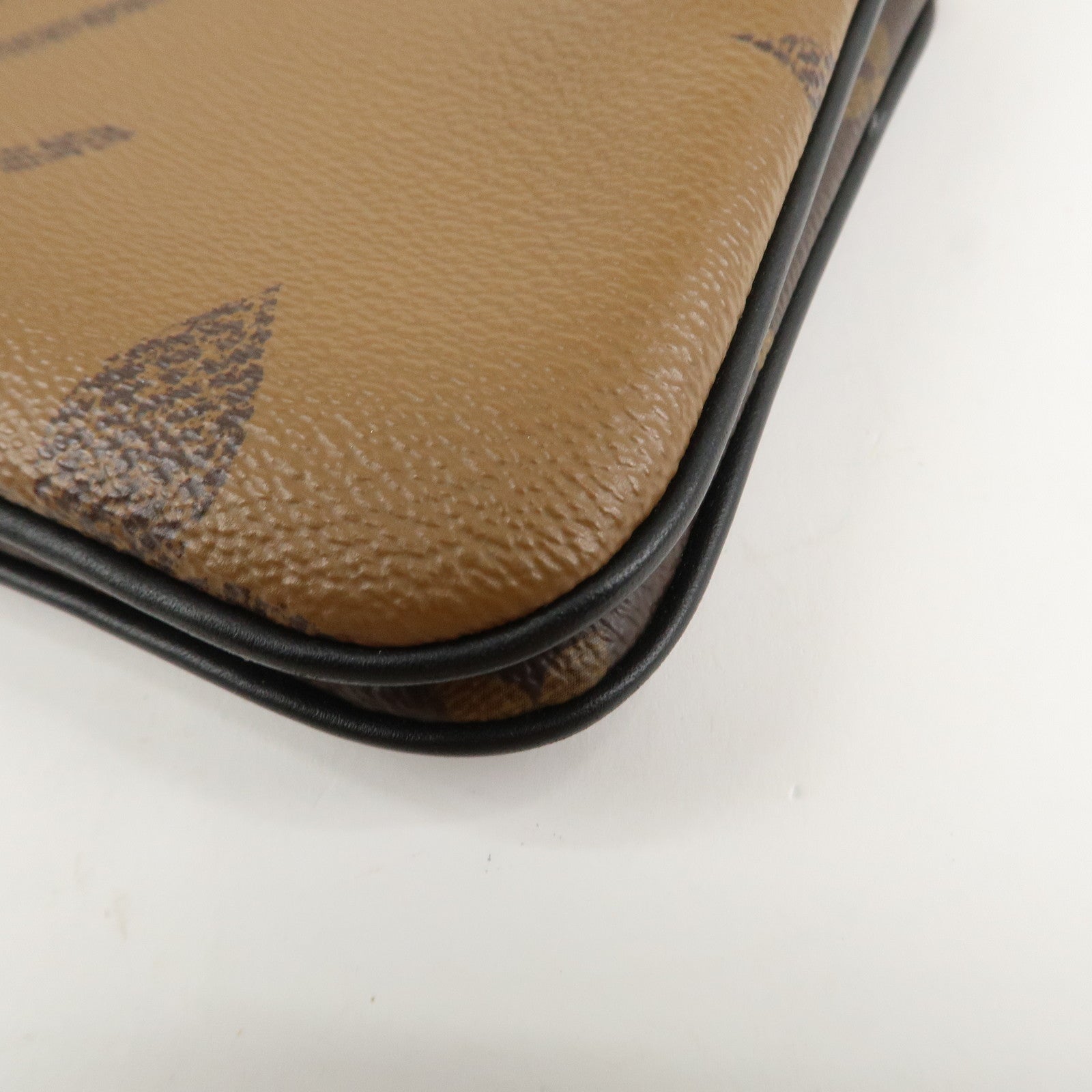 Louis Vuitton Monogram Reverse Pochette Double Zip Bag M69203