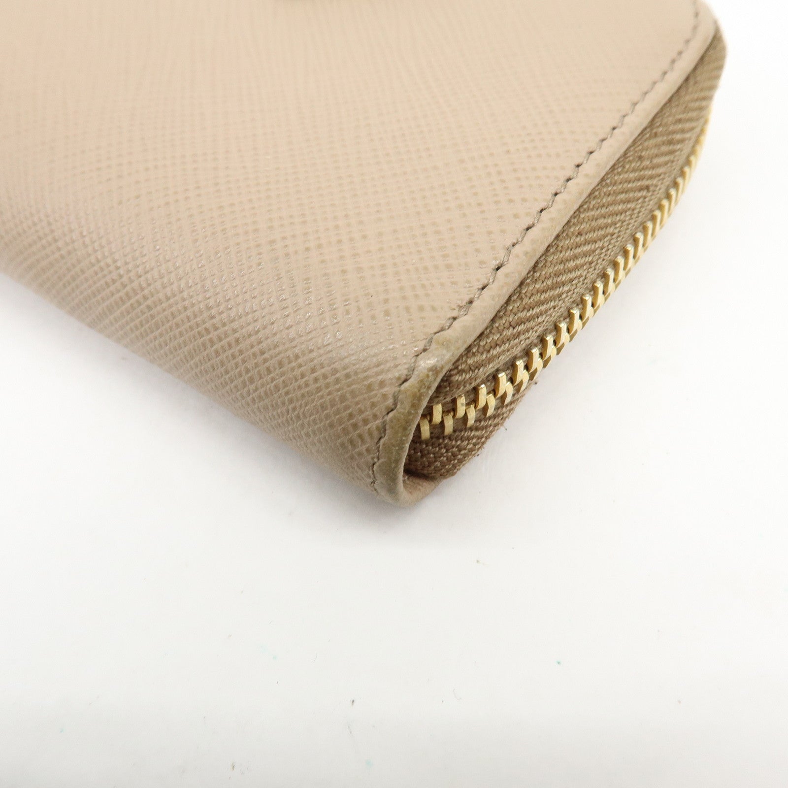 PRADA Triangle Logo Saffiano Leather Round Zippy Compact Wallet