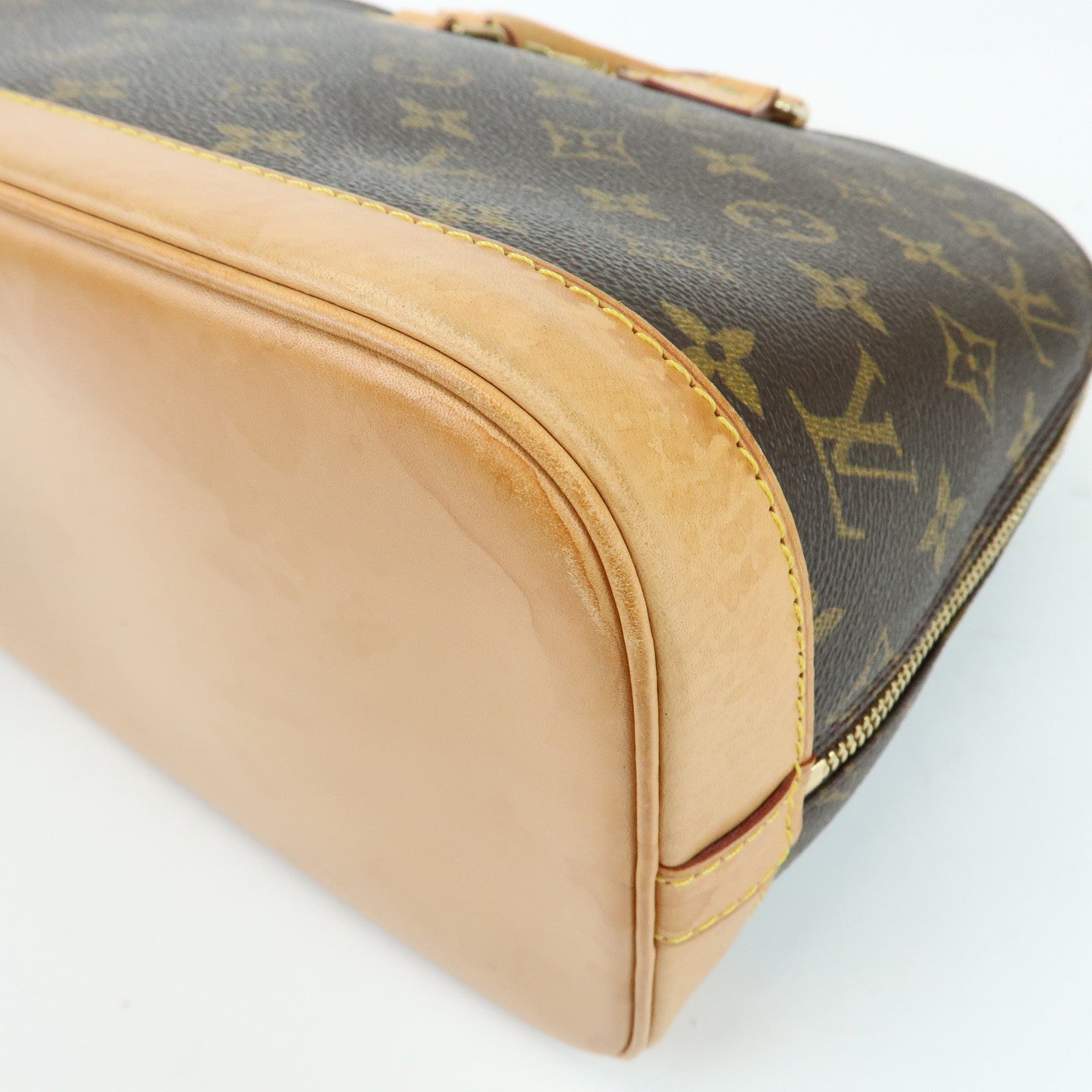 Louis Vuitton Monogram Alma Canvas Leather Hand Bag Brown M51130