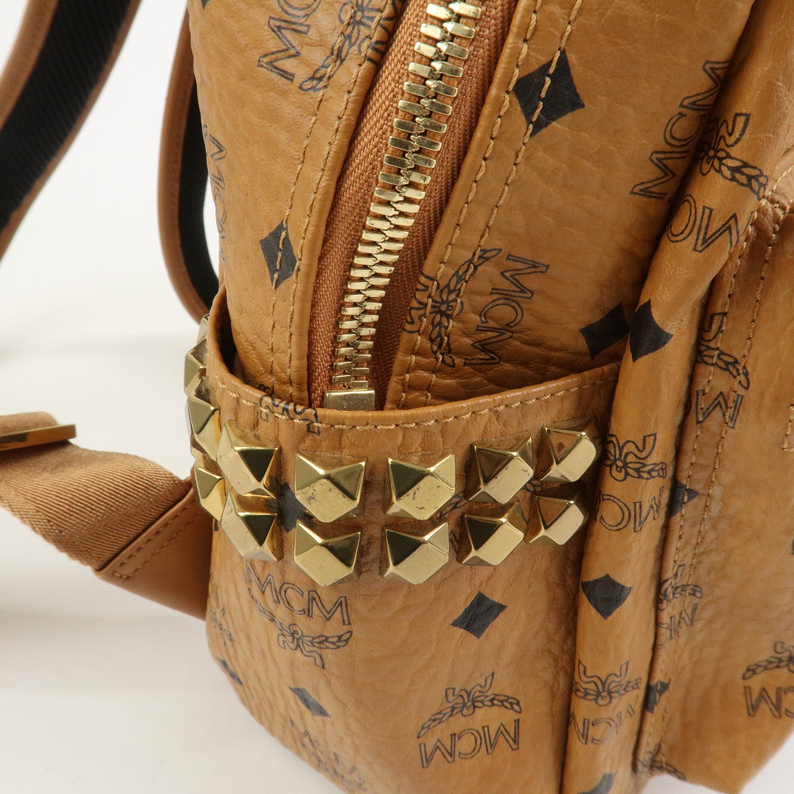 MCM Visetos PVC Leather Backpack Rucksack Studs Cognac