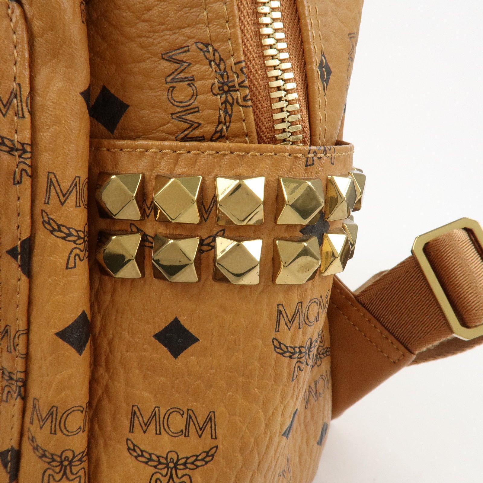 MCM Visetos PVC Leather Backpack Rucksack Studs Cognac