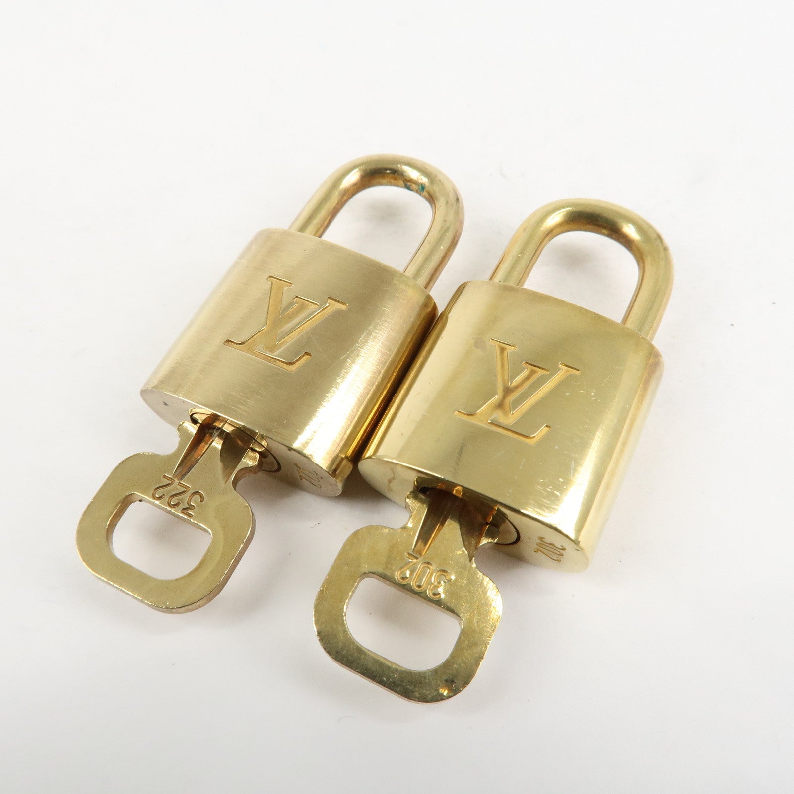 Louis Vuitton Set of 10 Lock & Key Cadena Key Lock Metal Gold
