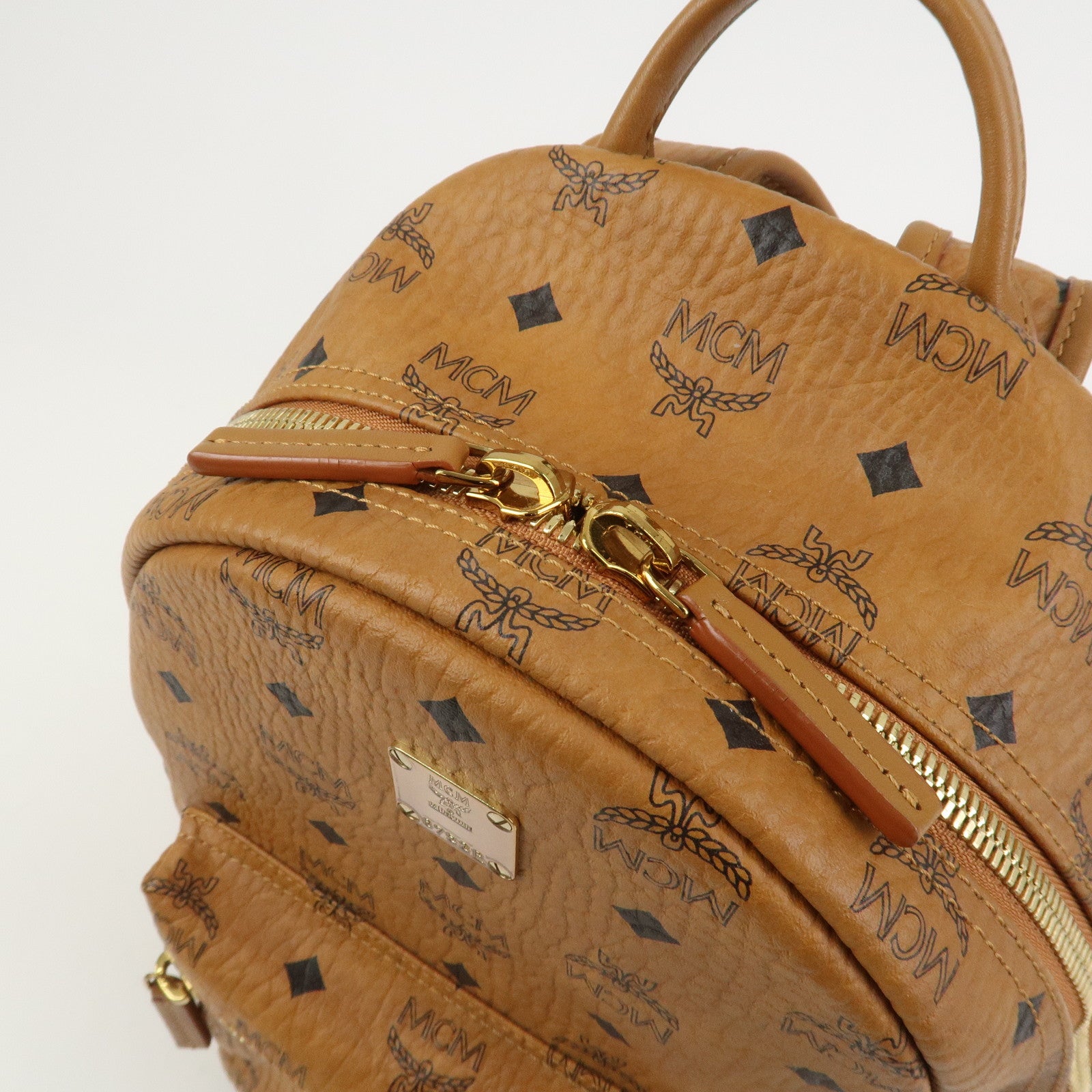 MCM Visetos PVC Leather Backpack Rucksack Studs Cognac