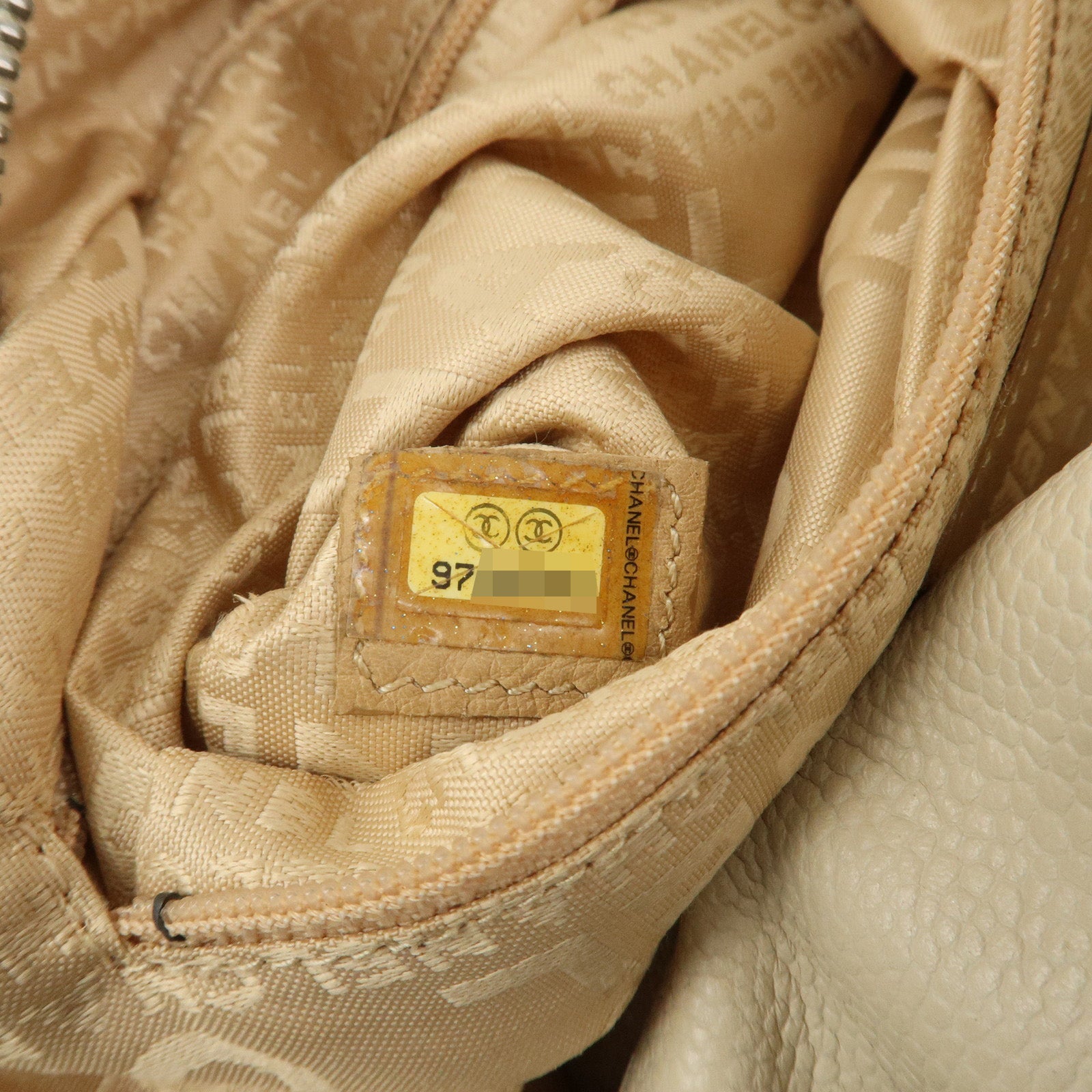 CHANEL Punching COCO Mark Caviarskin Hand Bag Beige