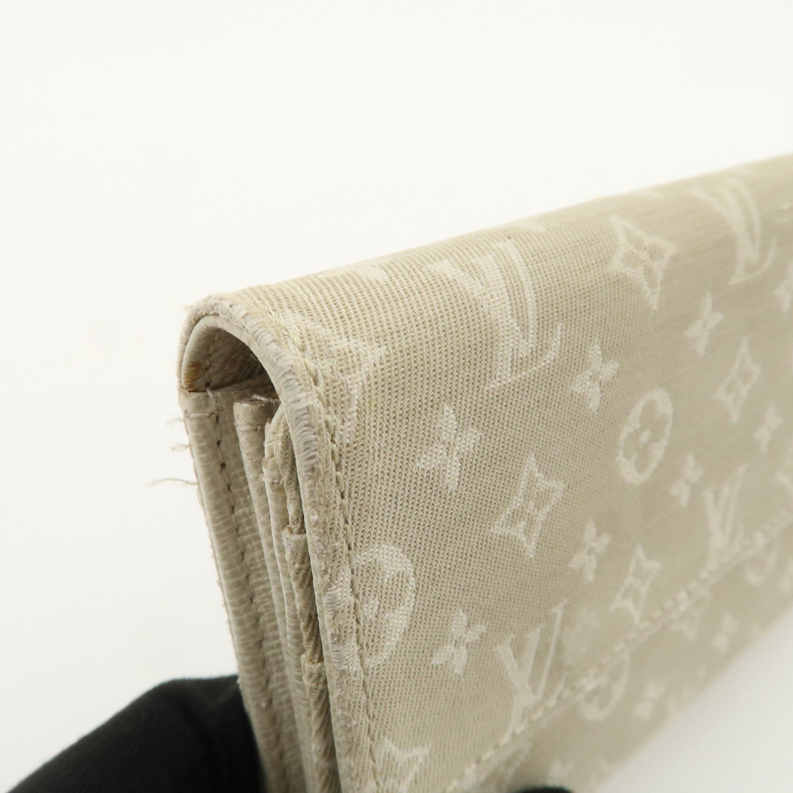 Louis Vuitton Monogram Mini Lin Portefeuille Sarah Wallet M95311