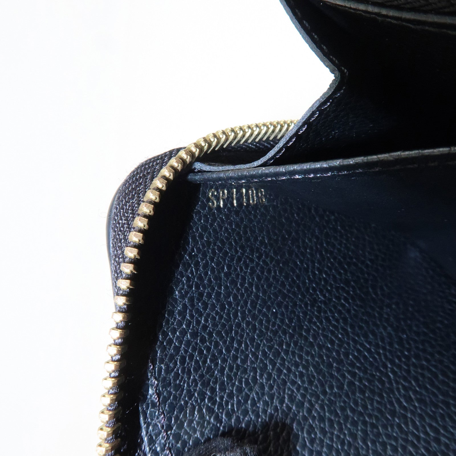 Louis Vuitton Monogram Empreinte Leather Round Zippy Wallet M61864