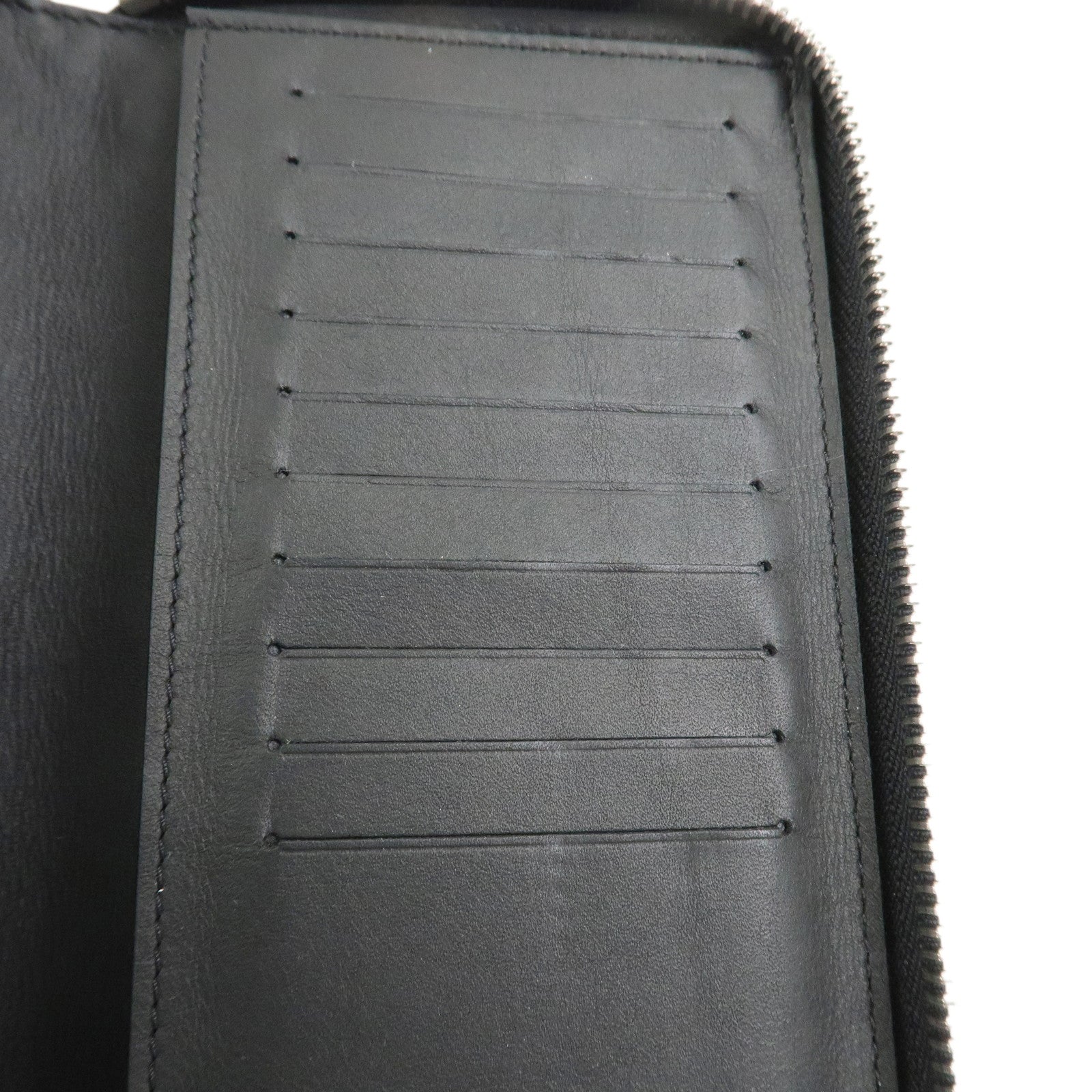 Louis Vuitton Torillon Leather Vertical Zippy Wallet Black M68228