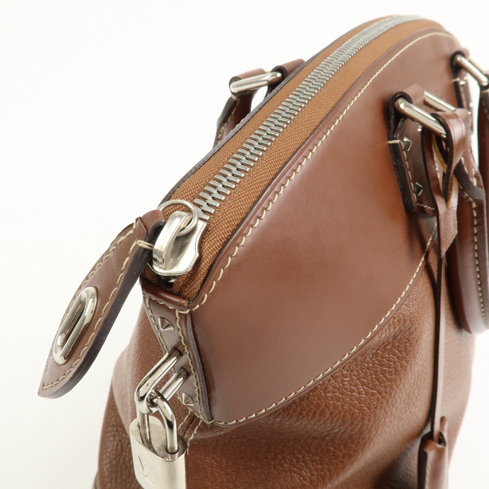 Louis Vuitton Suhari Leather Lock it MM Hand Bag Sienne M91889