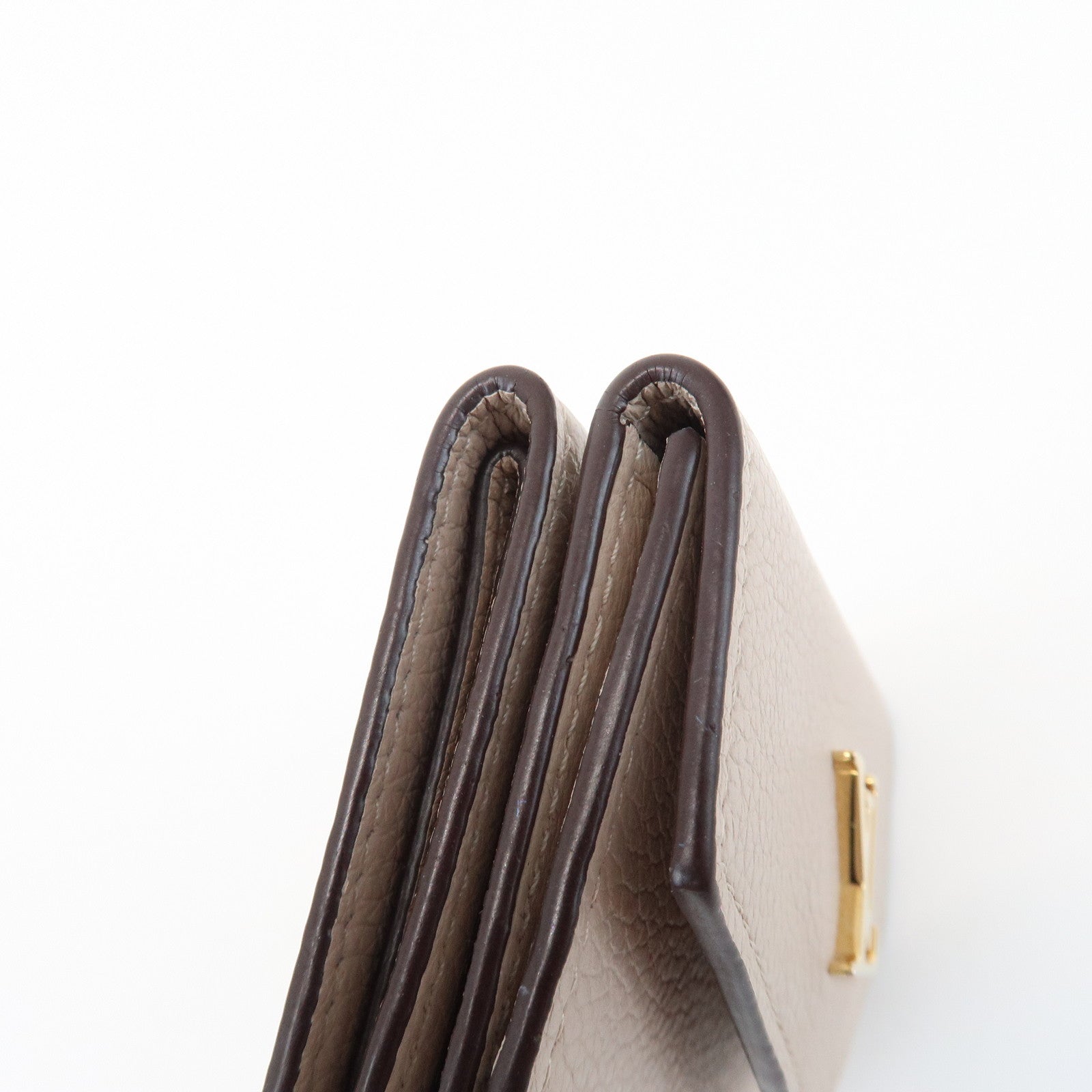 Louis Vuitton Torillon Portefeuille Lock Mini Wallet Greige M69340
