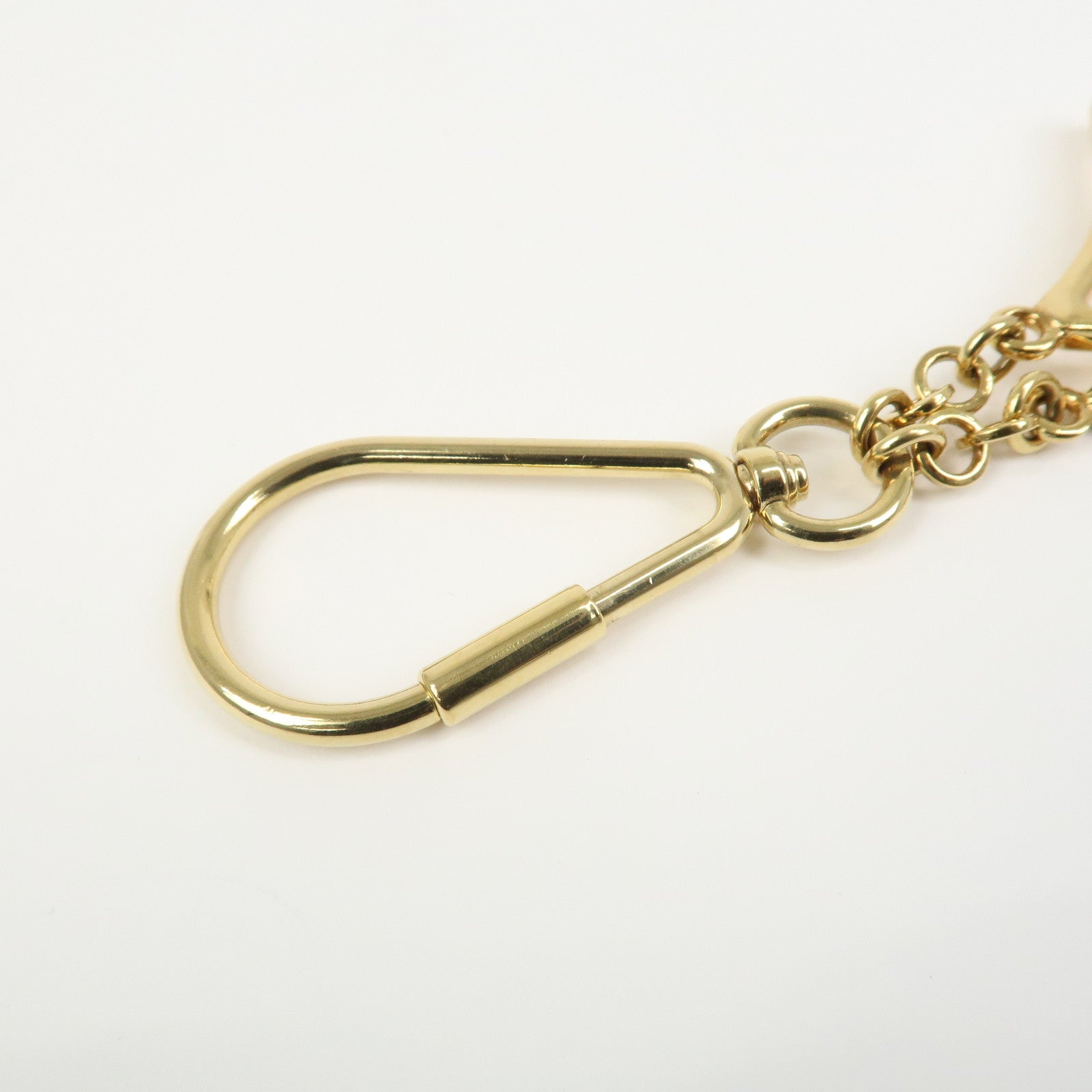 Louis Vuitton Porte Cles Puzzle Bag Charm Dark Brown Gold M65218