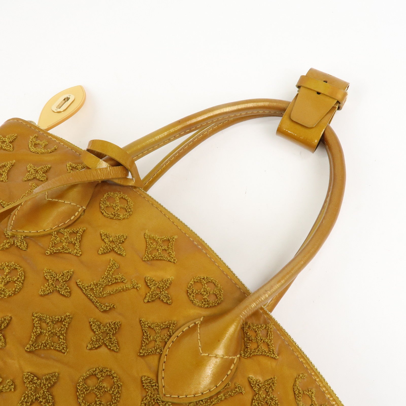 Louis Vuitton Monogram Lockit Bouclette Hand Bag Gold M40601