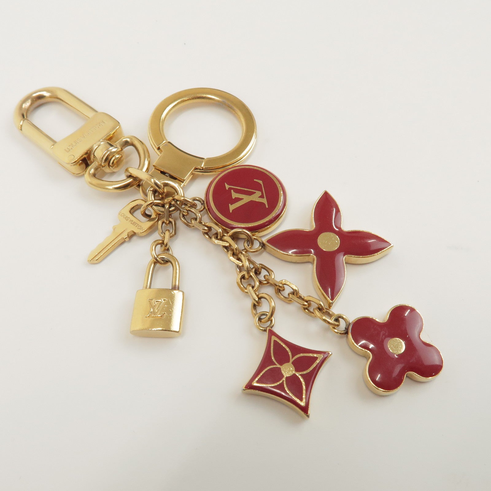Louis Vuitton Porte Cles Pompille Metal Bag Charm Gold Red M91928
