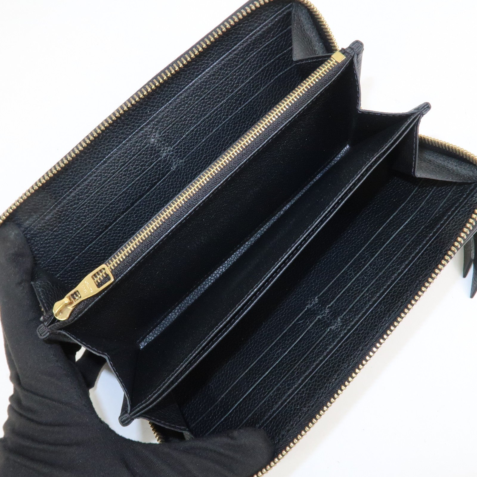 Louis Vuitton Monogram Empreinte Leather Round Zippy Wallet M61864