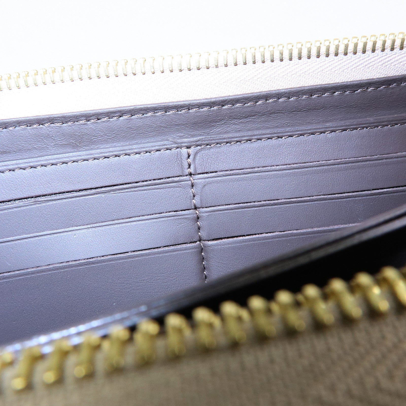 Louis Vuitton Portefeuille Comete Leather Long Wallet Greige M63104