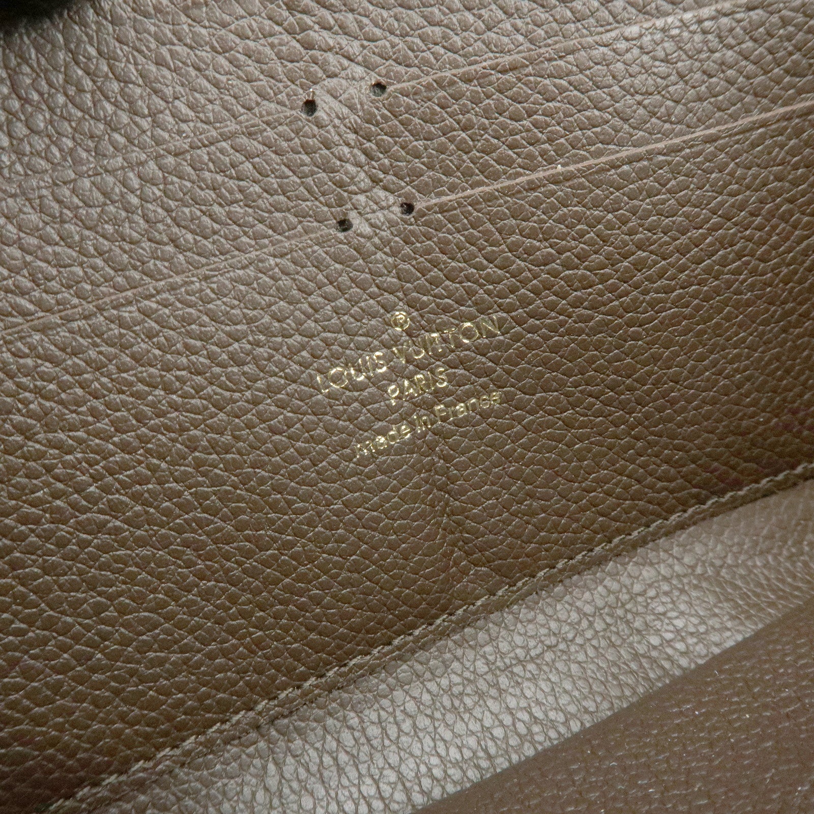Louis Vuitton Monogram Empreinte Round Zippy Wallet Terre M60548
