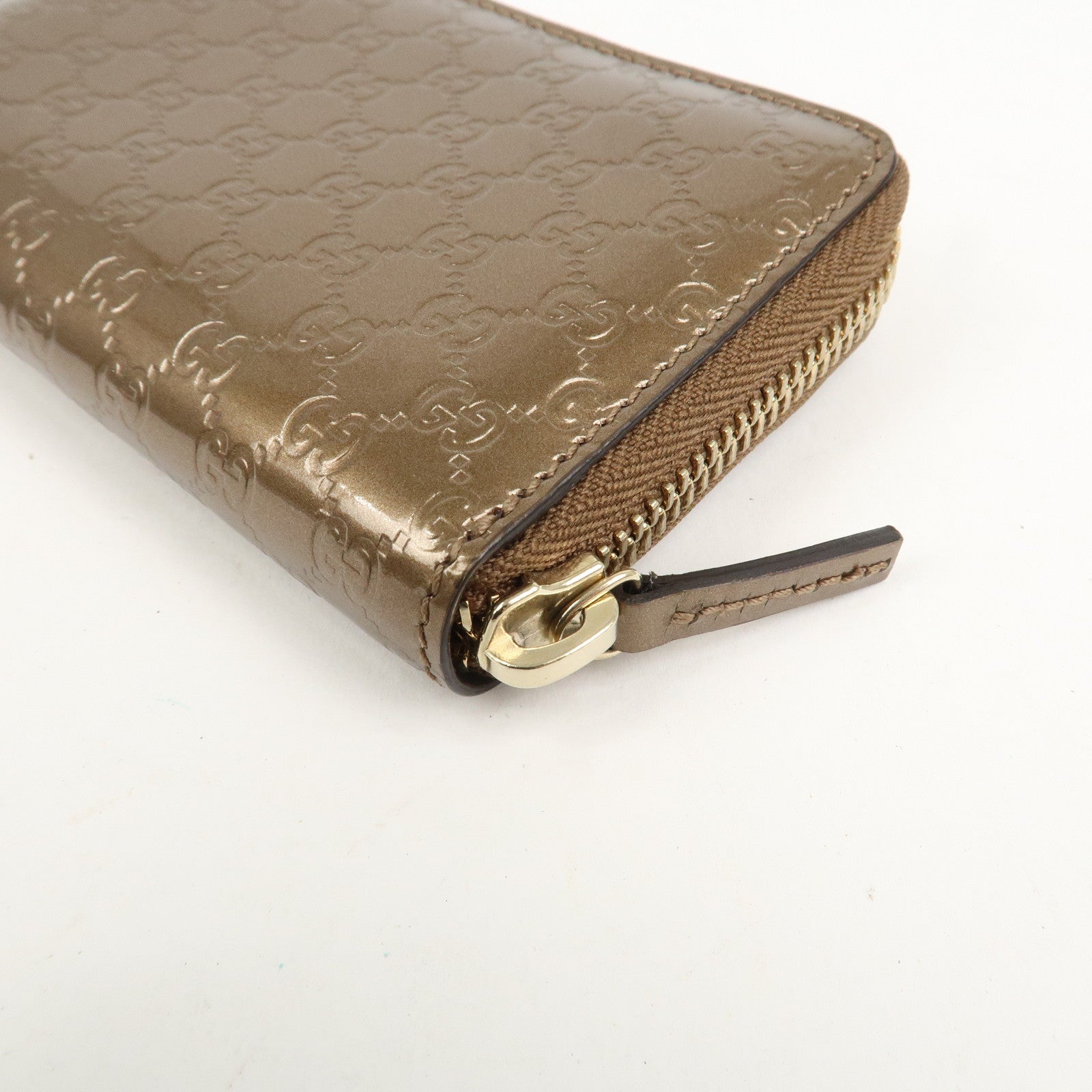 GUCCI Micro Guccissima Leather Zippy Wallet Card Case Bronze 255452