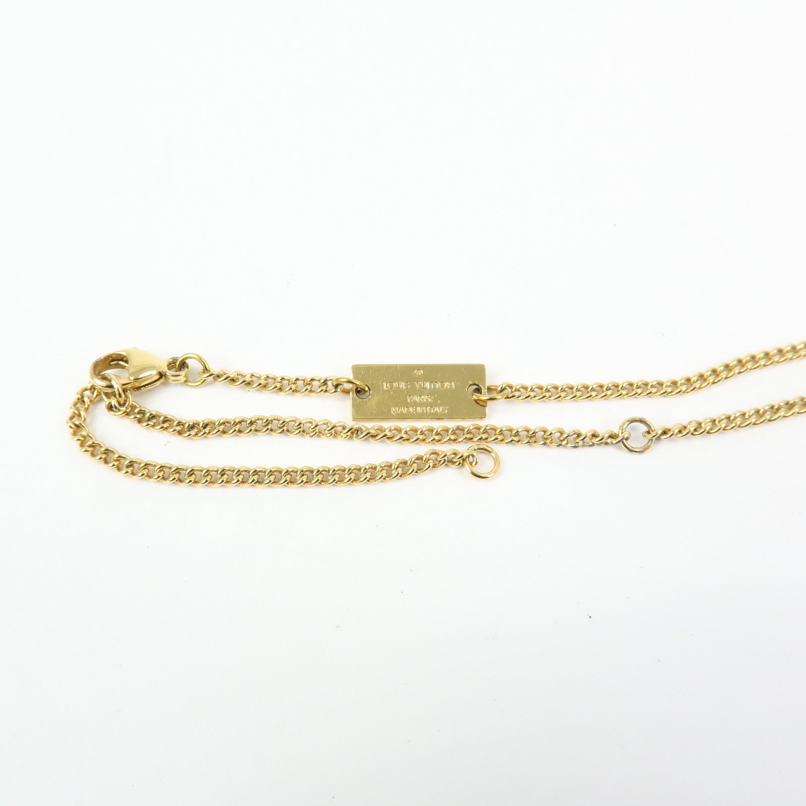 Louis Vuitton Metal Monogram Ring Necklace Gold M80189