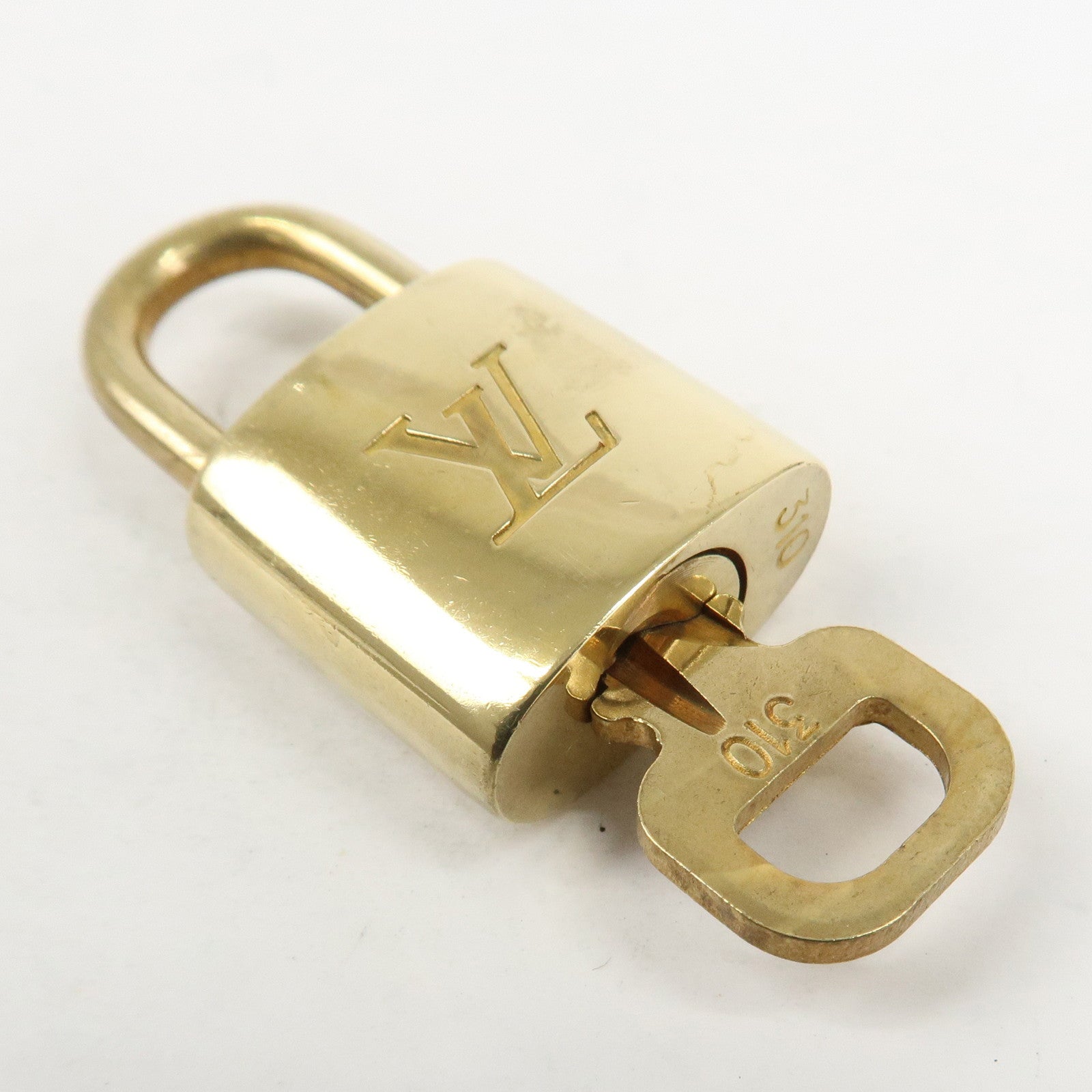 Louis Vuitton Set of 10 Lock & Key Cadena Key Lock Metal Gold