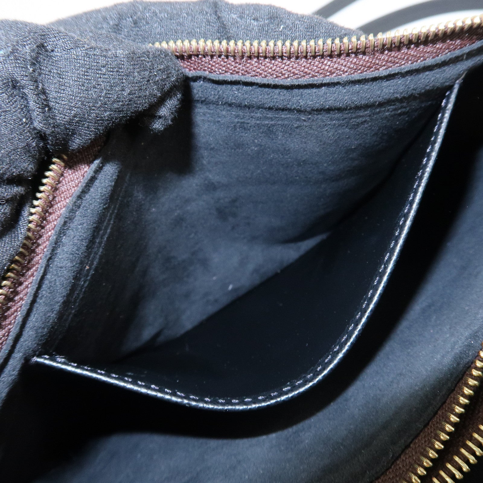 Louis Vuitton Monogram Reverse Pochette Double Zip Bag M69203