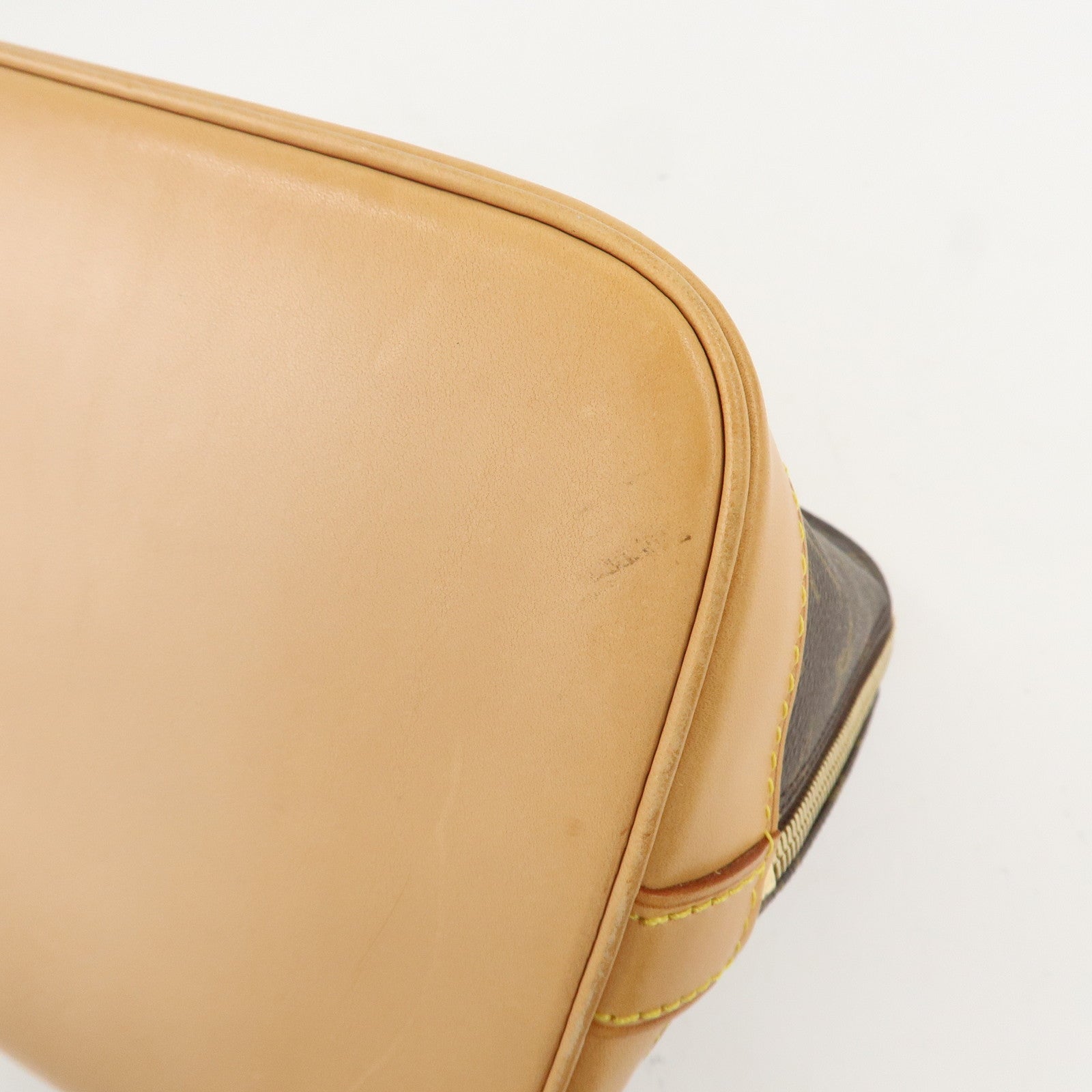 Louis Vuitton Monogram Alma Hand Bag Brown M51130