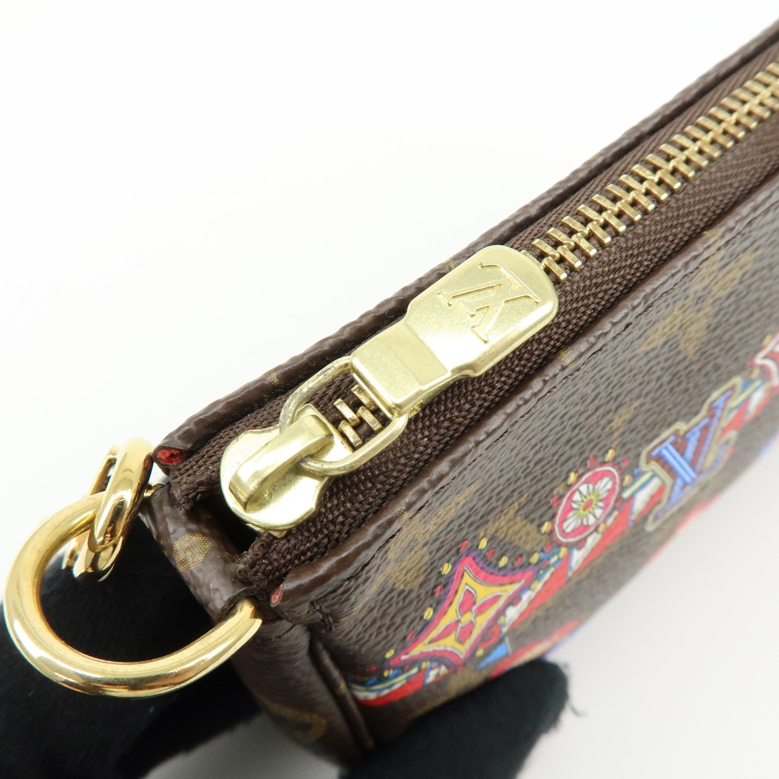 Louis Vuitton Monogram Vivienne Mini Pochette Accessoires M69976