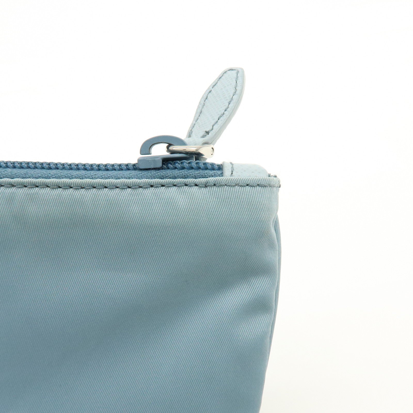 PRADA Triangle Logo TESSUTO IMPUNTU Nylon Pouch Light Blue 1NH545