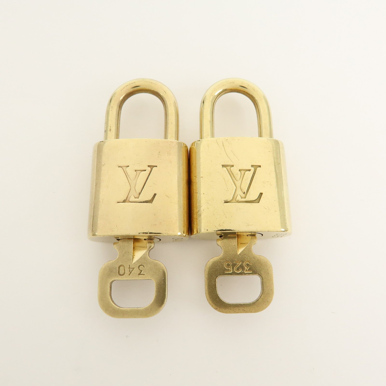 Louis Vuitton Set of 10 Lock & Key Cadena Key Lock Gold