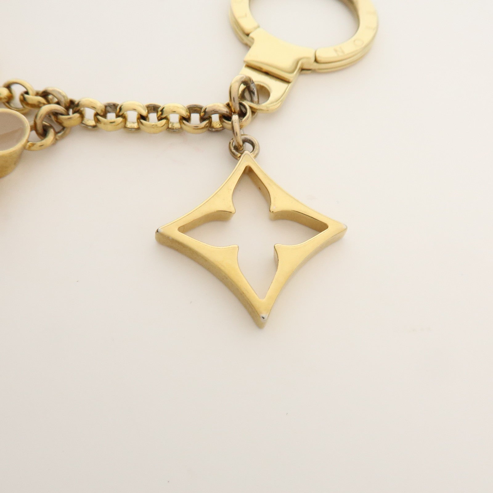 Louis Vuitton Fleur de Monogram Bag Charm Key Chain Gold M65111