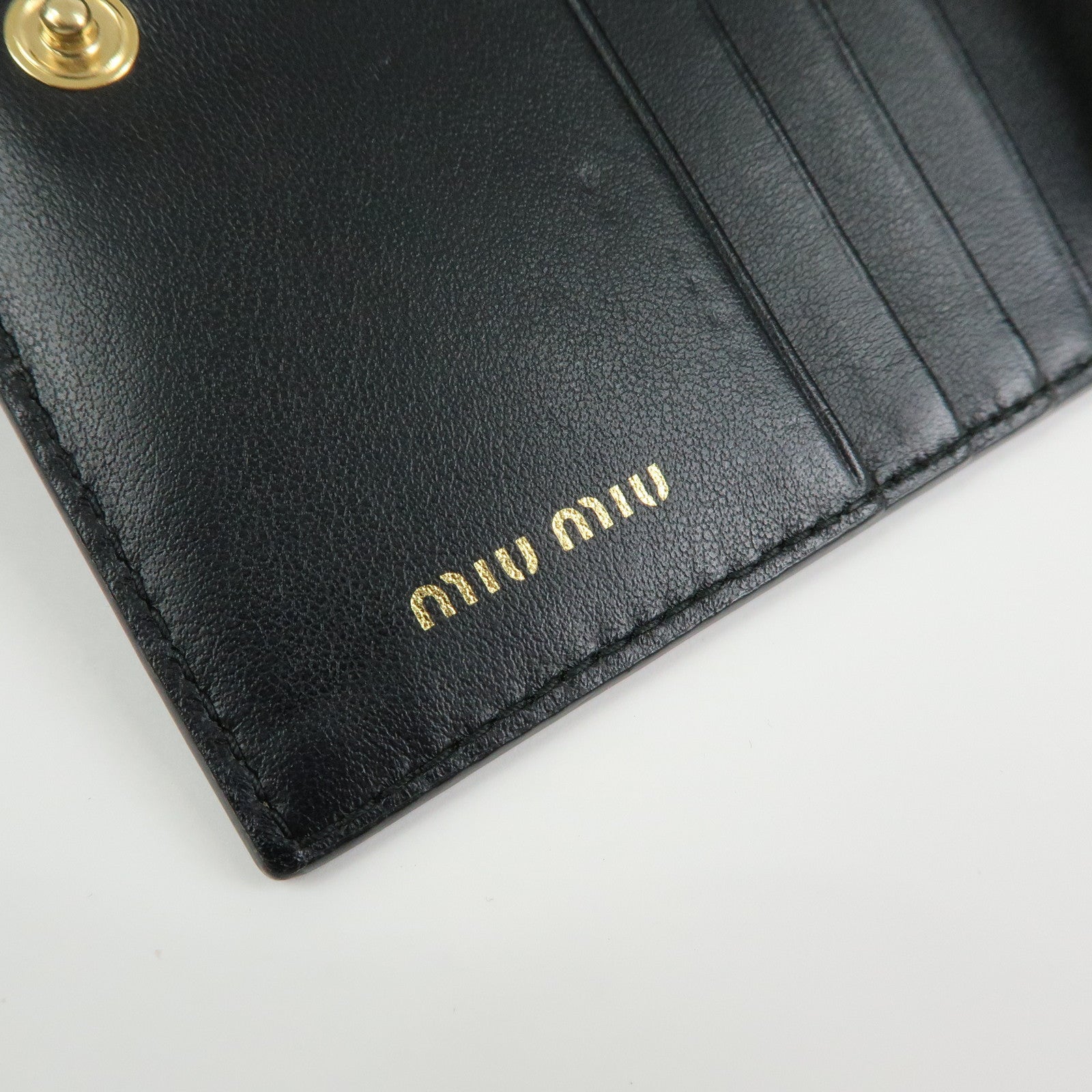 MIU MIU Embossed Patent Leather Bi-fold Compact Wallet Black 5MV204