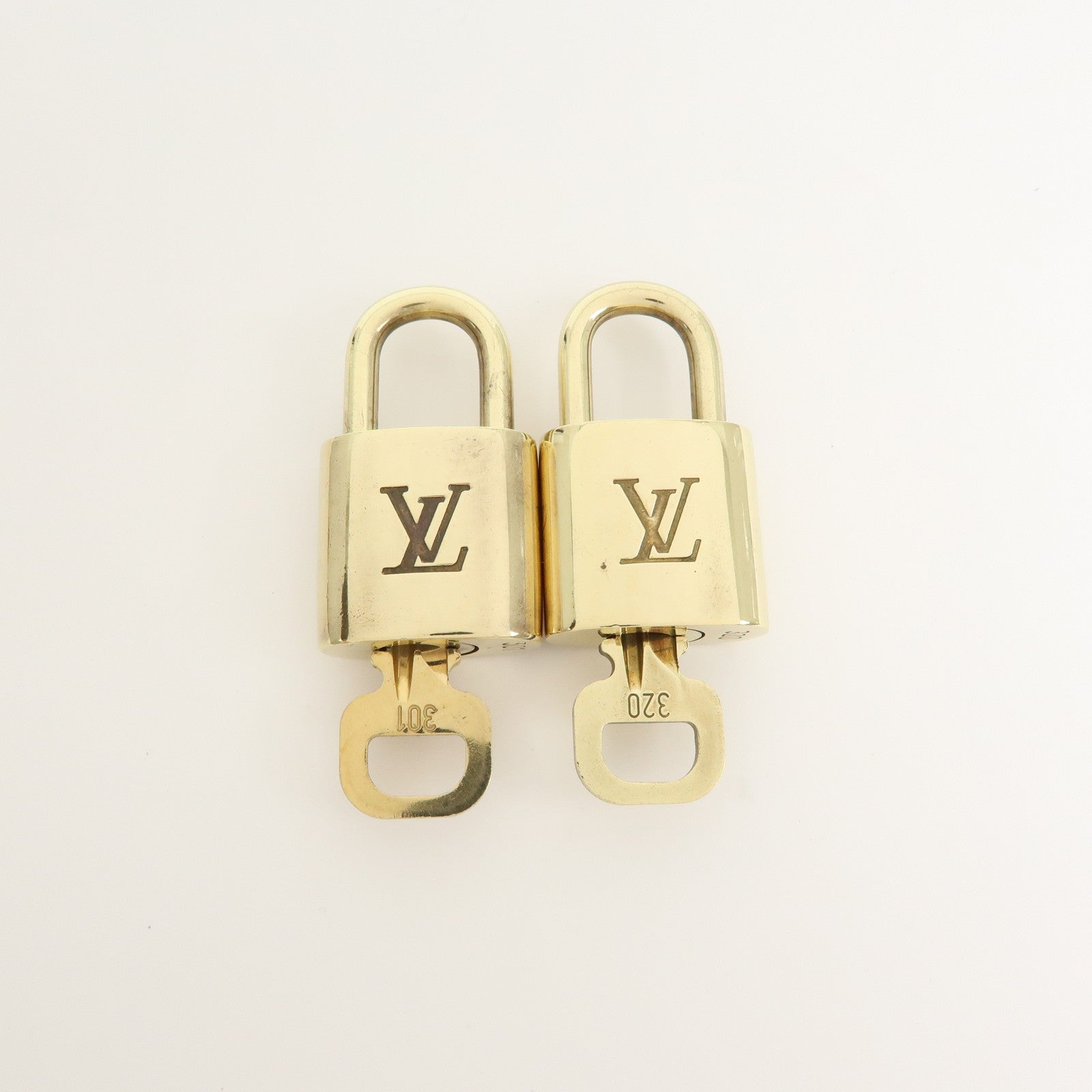 Louis Vuitton Set of 10 Lock & Key Cadena Key Lock Gold