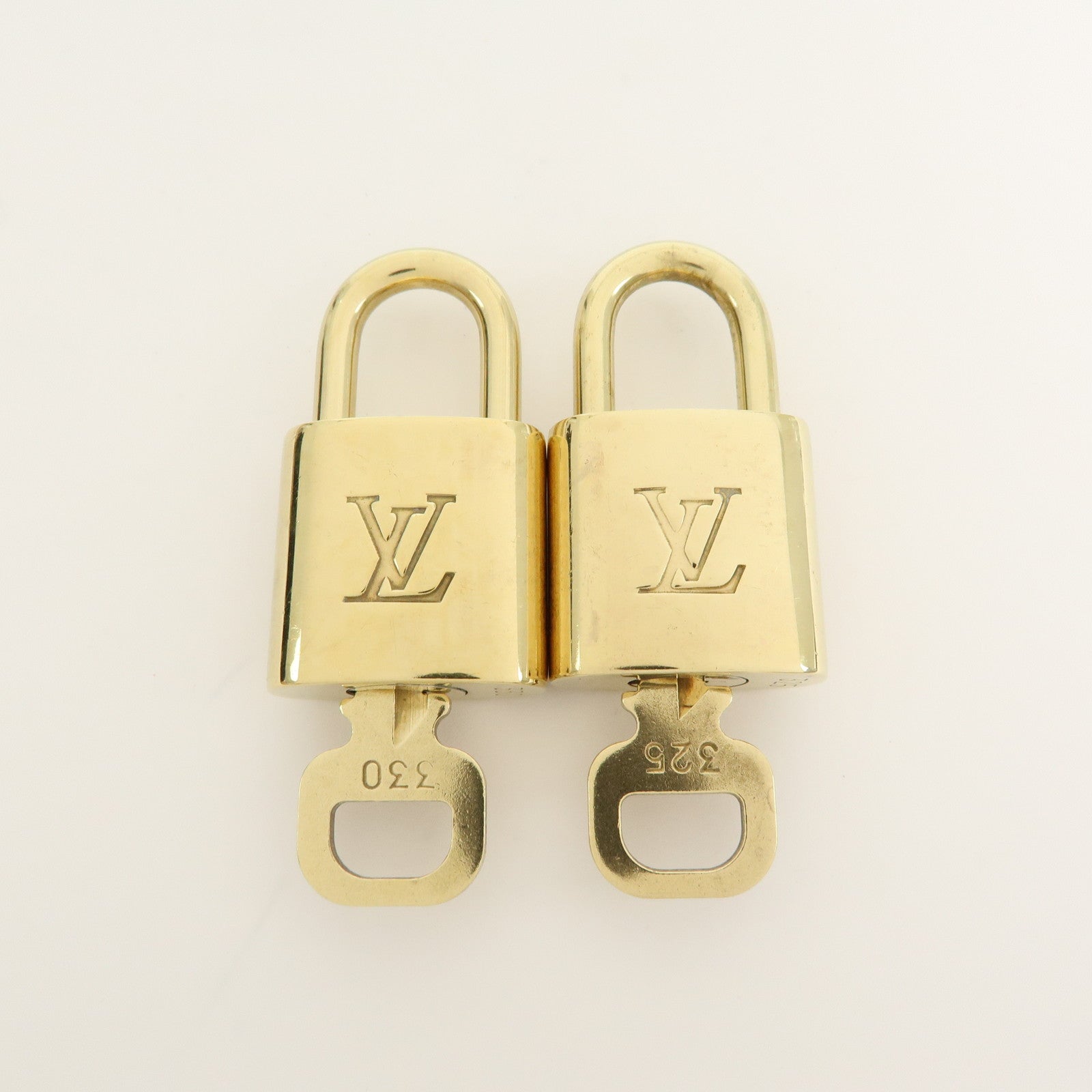 Louis Vuitton Set of 10 Lock & Key Cadena Key Lock Gold