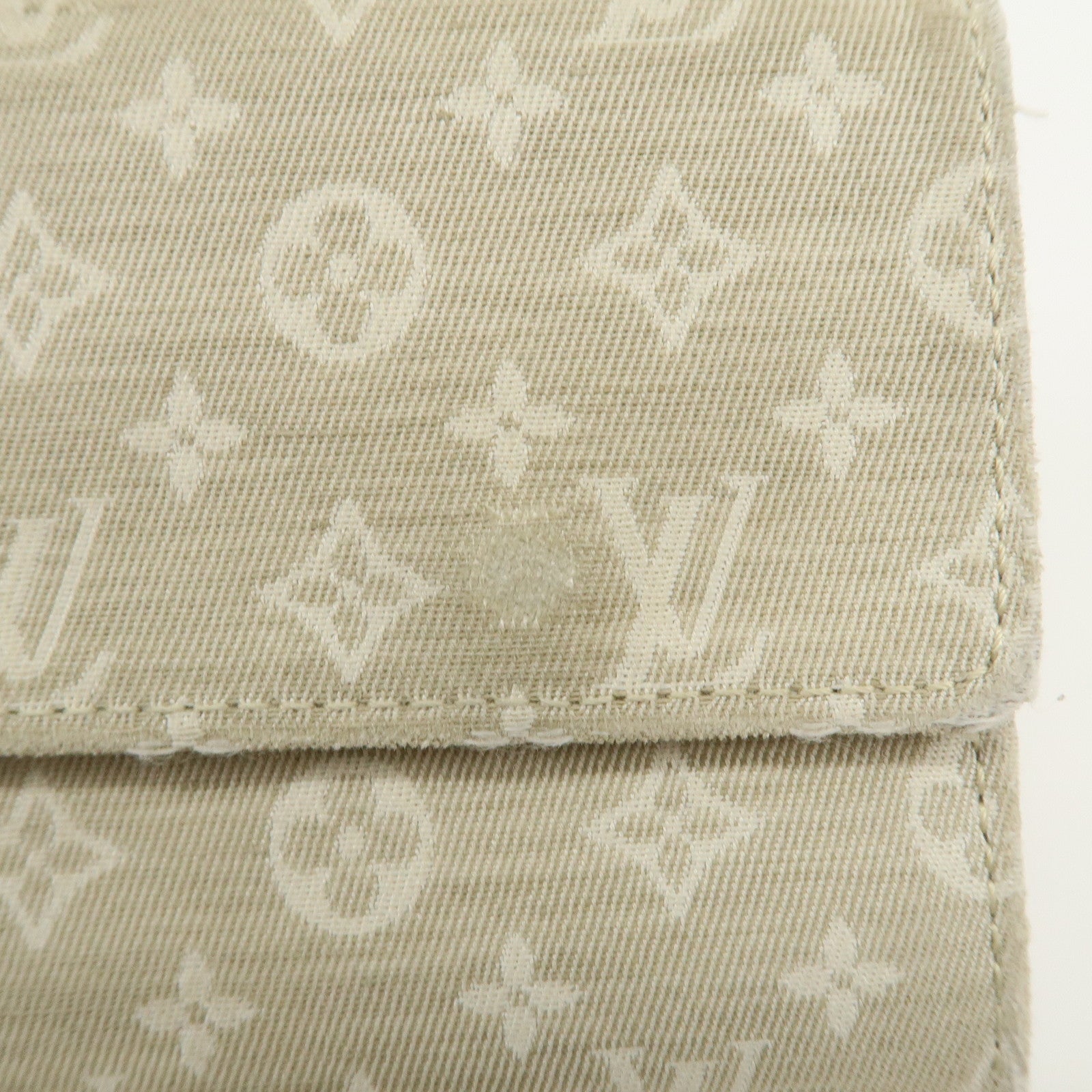 Louis Vuitton Monogram Mini Lin Portefeuille Sarah Wallet M95311