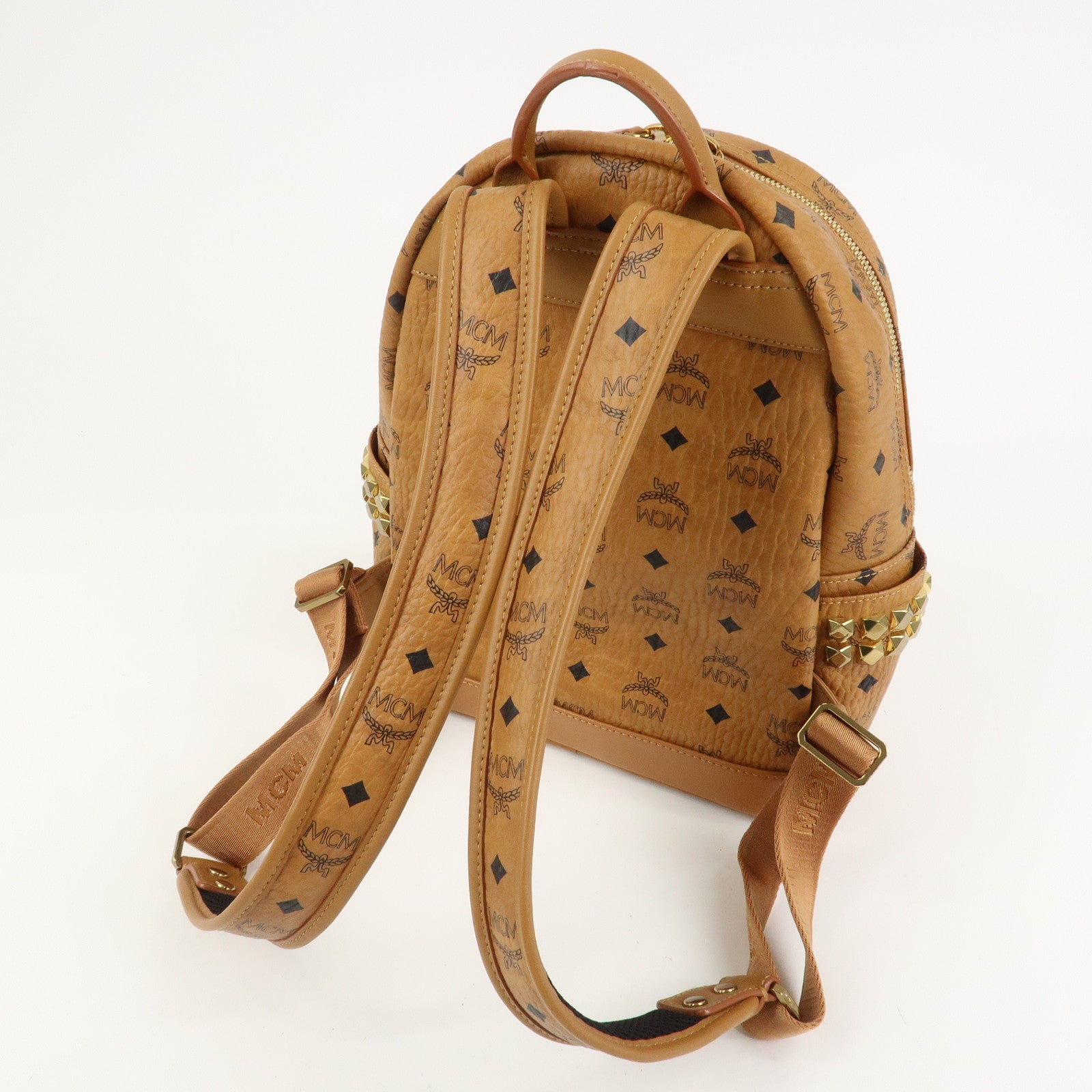 MCM Visetos PVC Leather Backpack Rucksack Studs Cognac