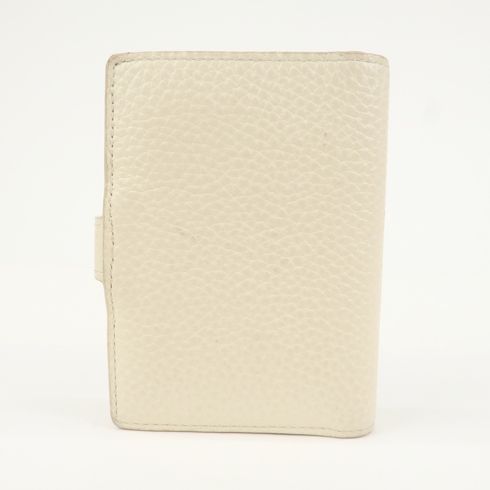 Louis Vuitton Capcines Taurillon Leather Vertical Wallet M11169