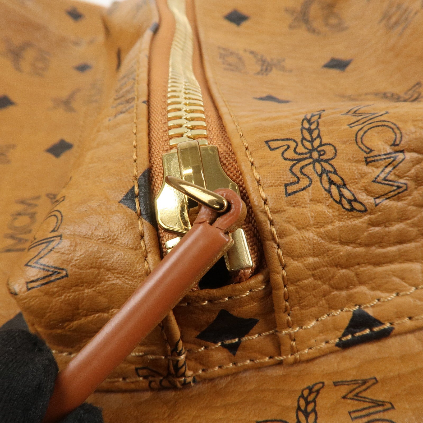 MCM Visetos PVC Leather Backpack Rucksack Studs Cognac