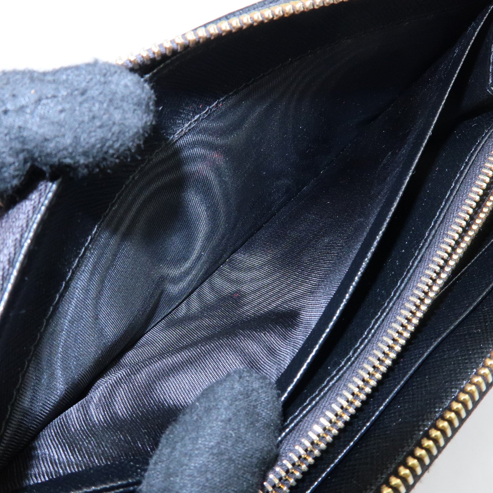 PRADA Logo Saffiano Leather Round Zippy Long Wallet Black 1ML506