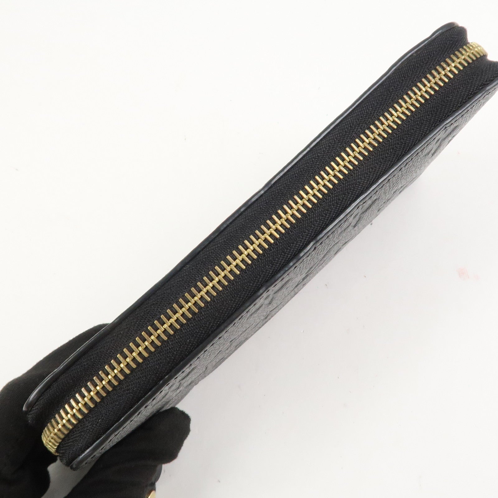 Louis Vuitton Monogram Empreinte Leather Round Zippy Wallet M61864