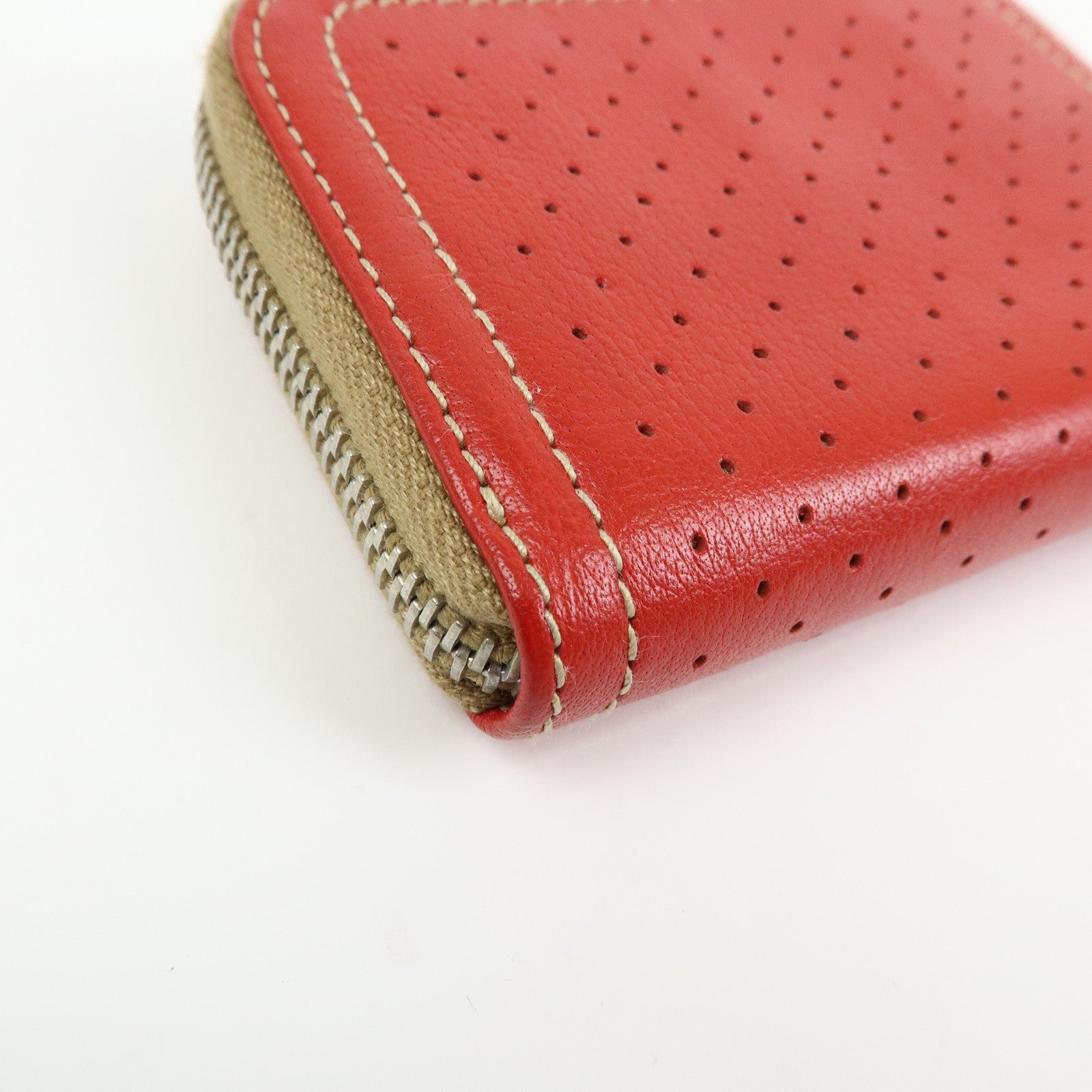 PRADA Triangle Logo Punched Leather Round Zippy Coin Case Red