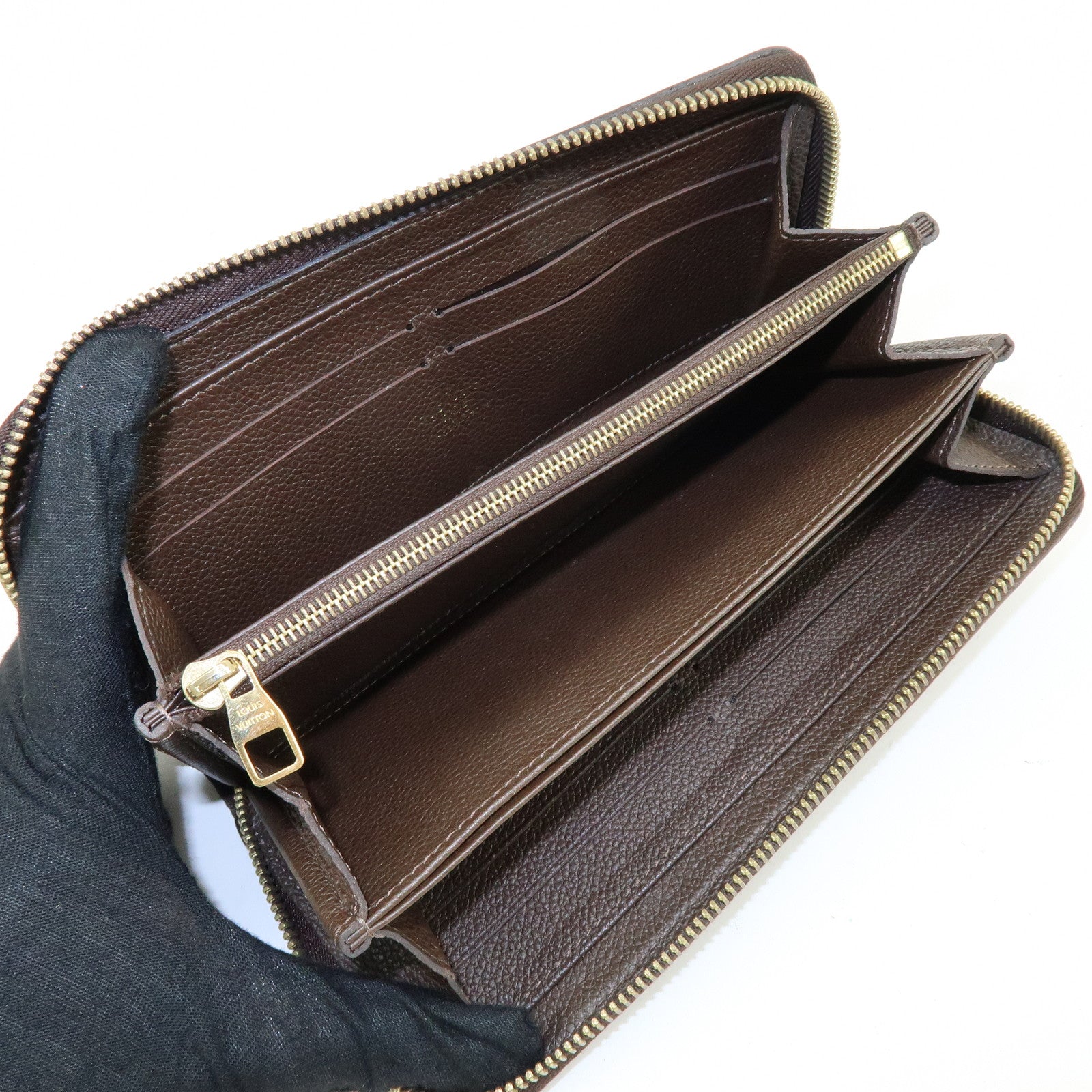 Louis Vuitton Monogram Empreinte Round Zippy Wallet Terre M60548