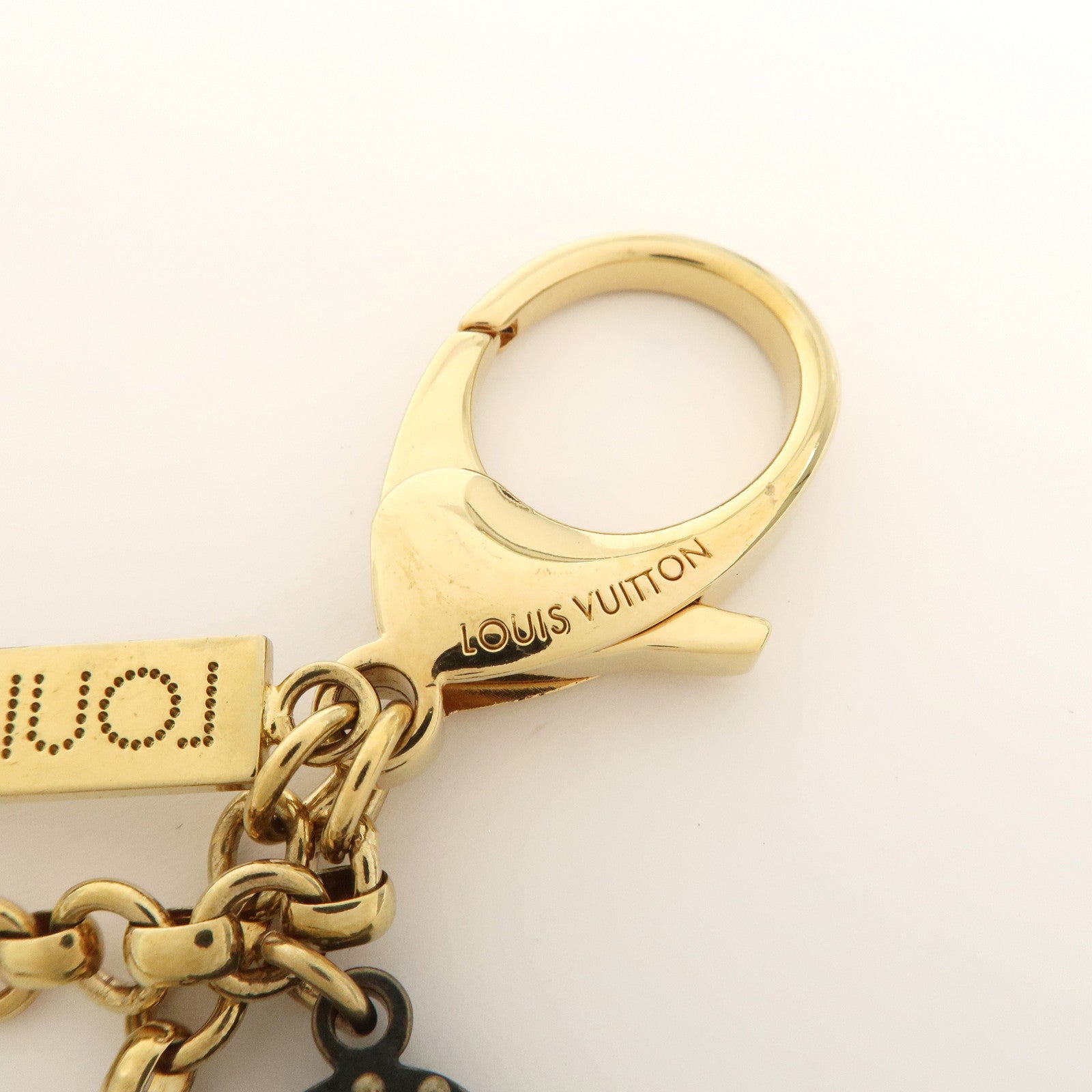 Louis Vuitton Monogram Bijoux Sac Tapage Bag Charm Gold M66350