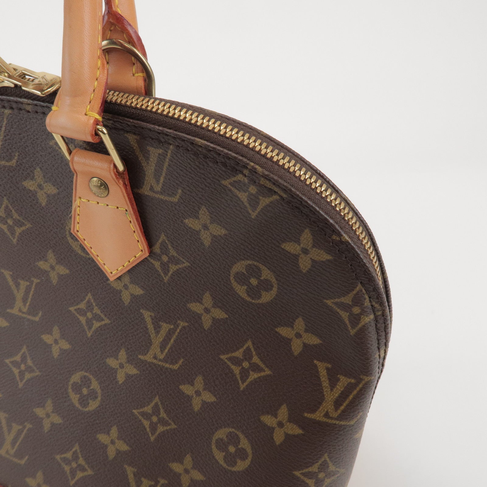 Louis Vuitton Monogram Alma Hand Bag Brown M51130