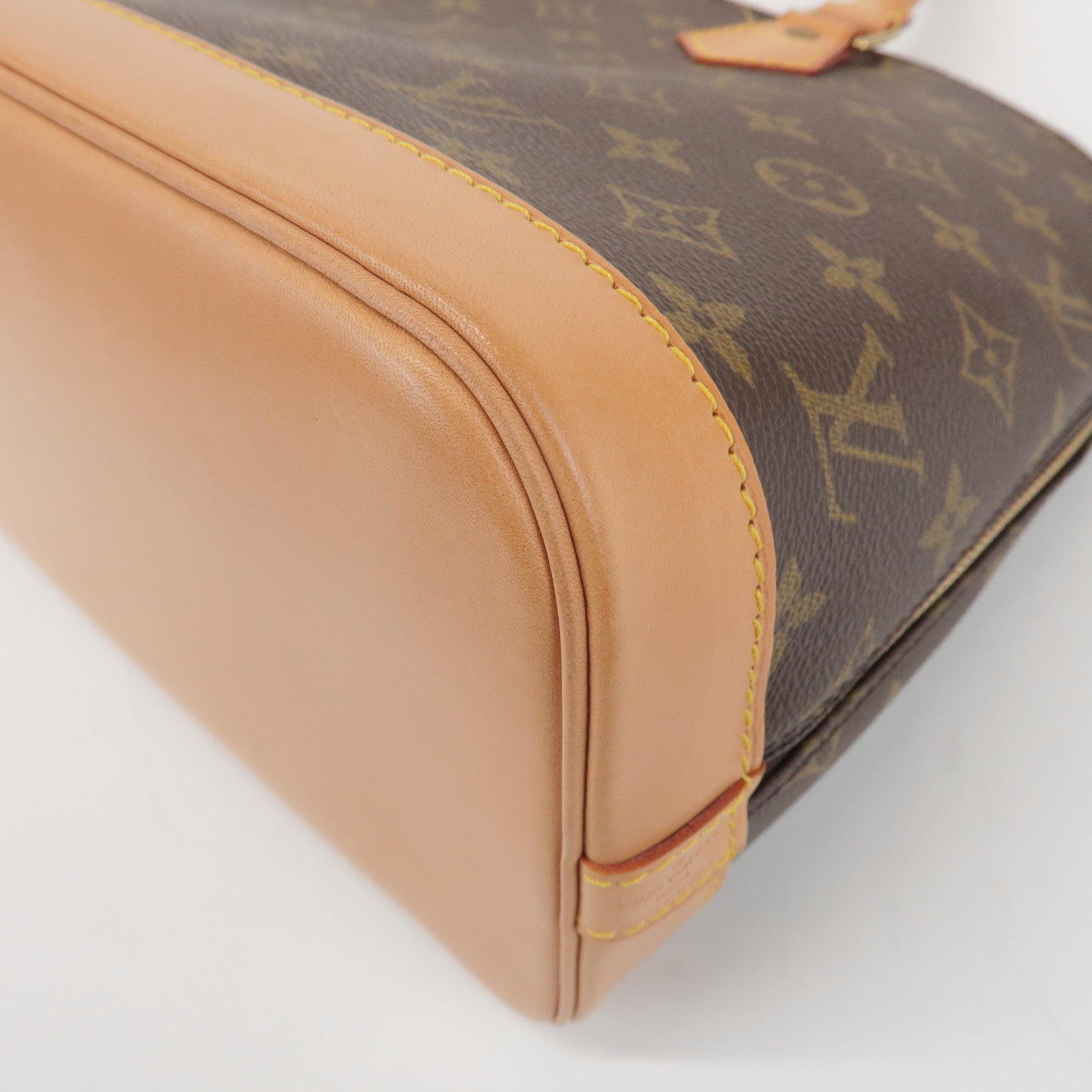 Louis Vuitton Monogram Alma Hand Bag Brown M51130