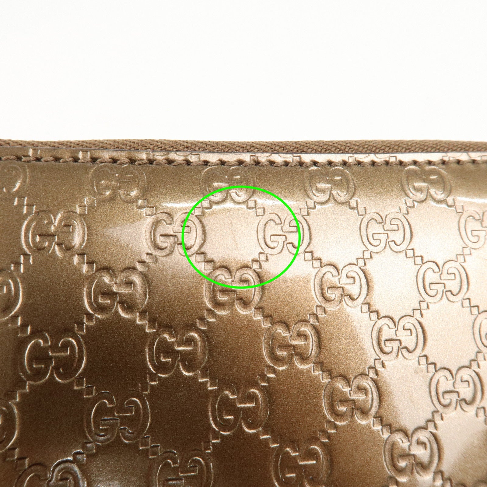 GUCCI Micro Guccissima Leather Zippy Wallet Card Case Bronze 255452