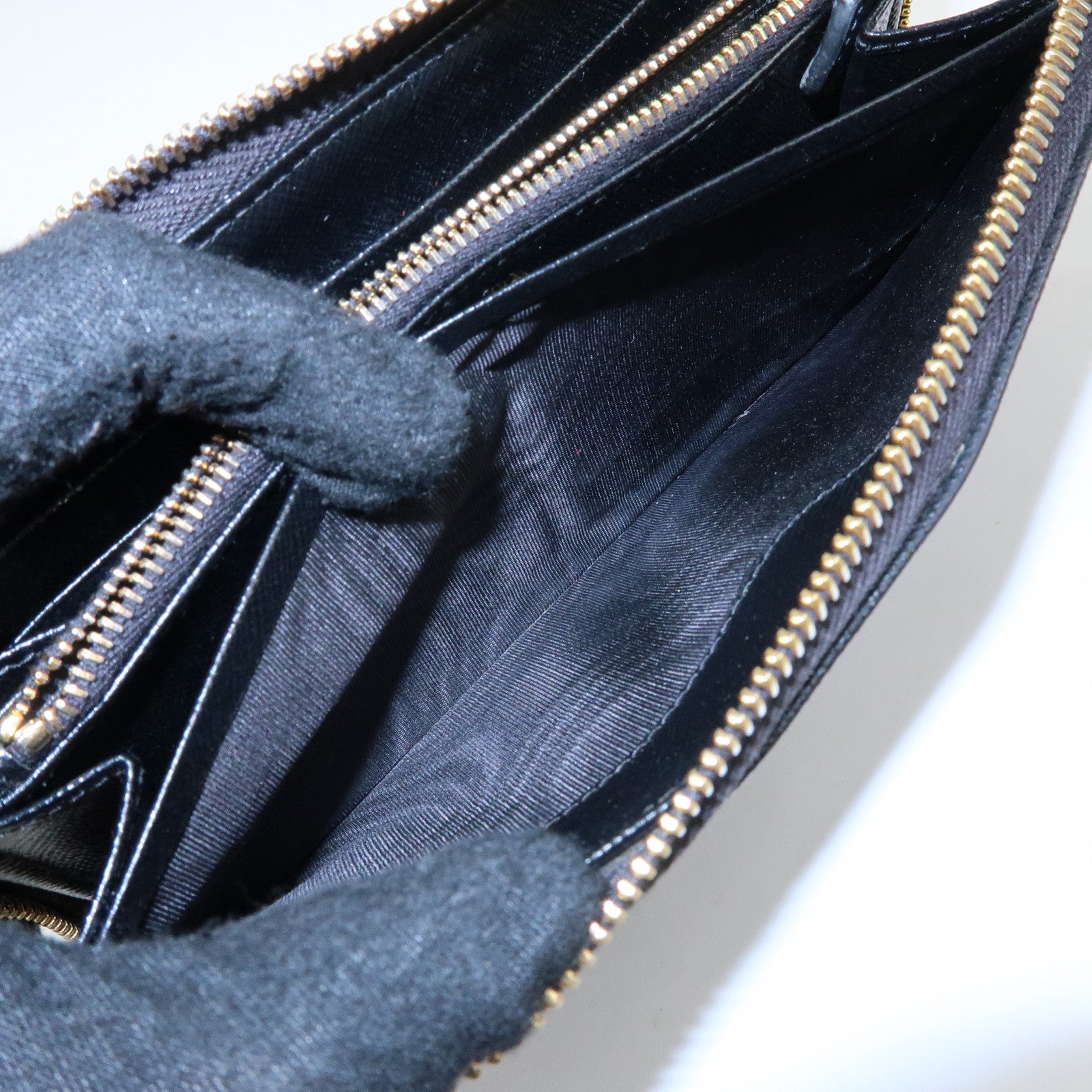 PRADA Logo Saffiano Leather Round Zippy Long Wallet Black 1ML506